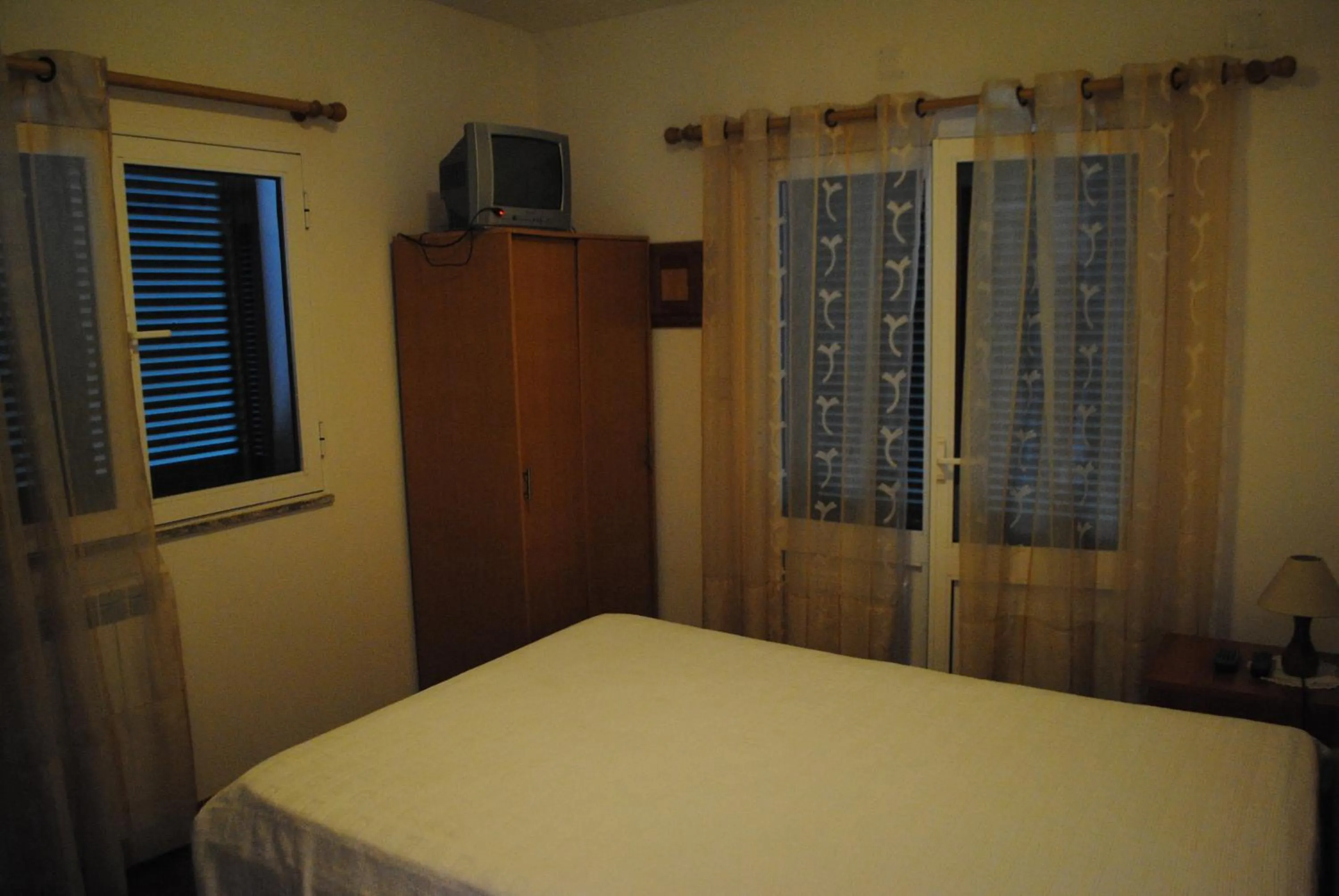 Bedroom, Bed in Casa Dos Santos Alojamento - Guest House
