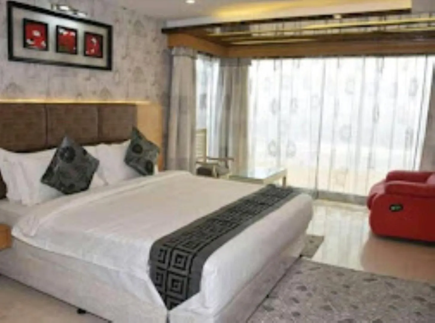 Bed in Blue Lily Beach Resort