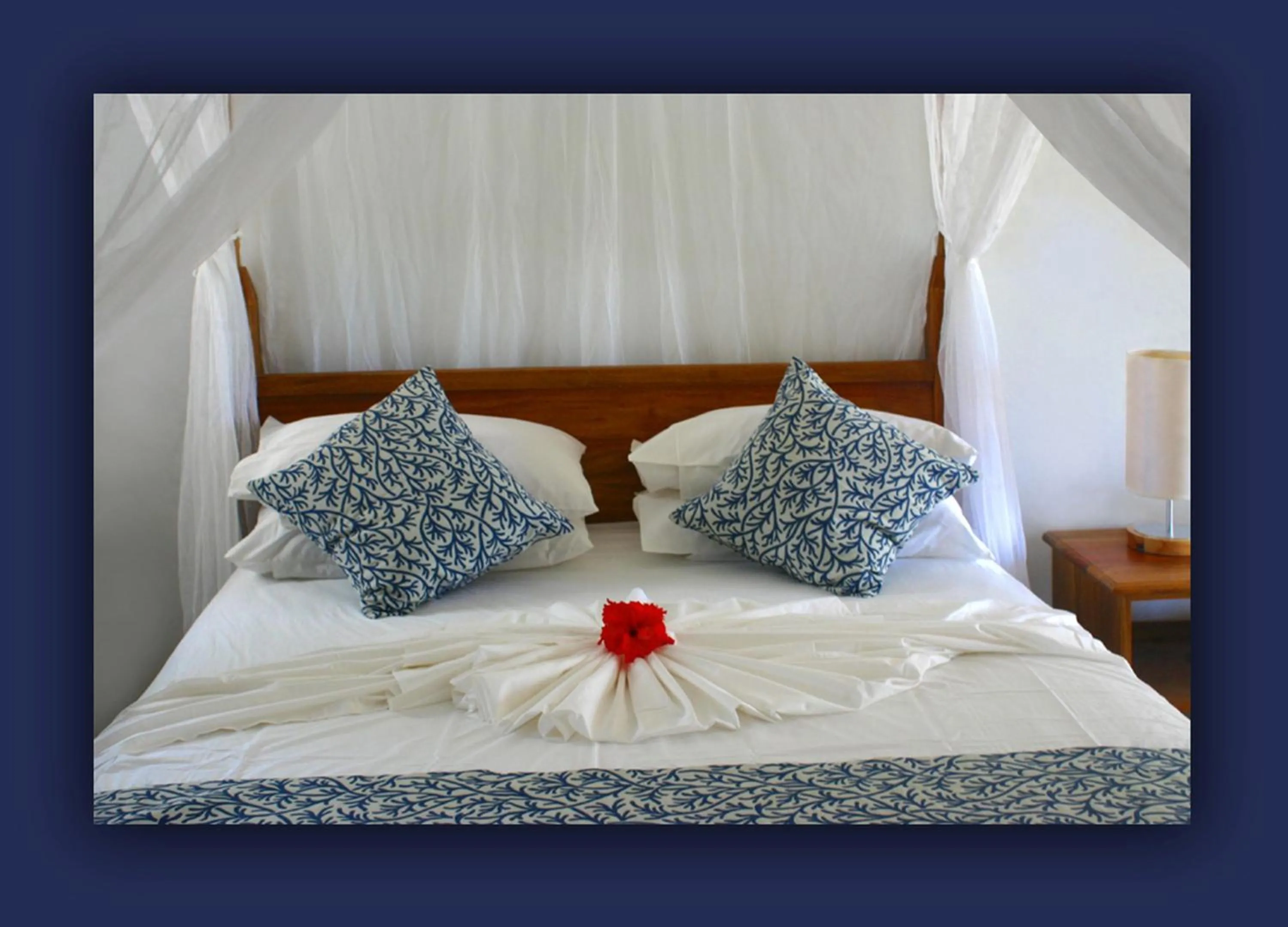 Bed in L'Hirondelle Self Catering Guest House