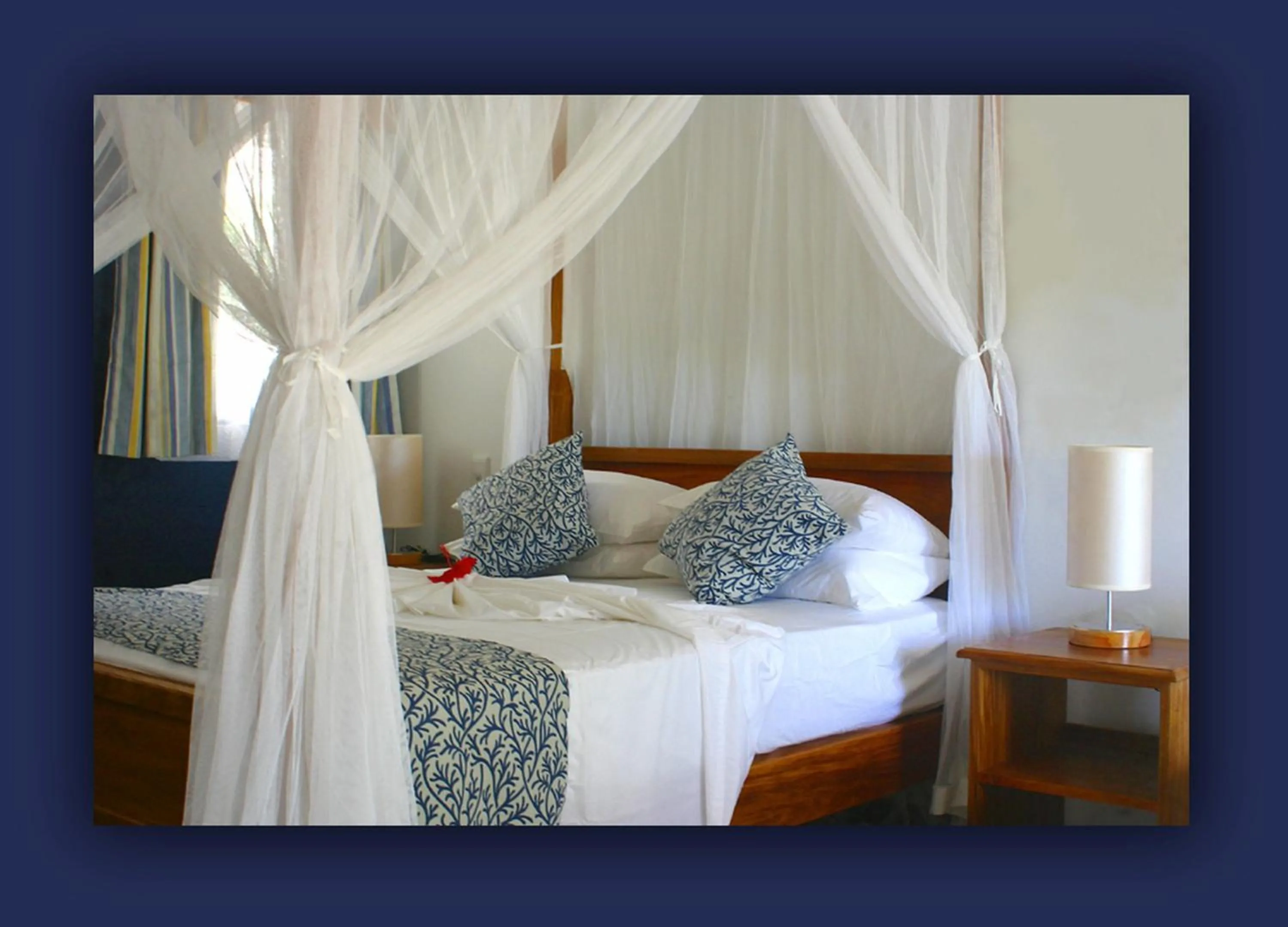 Bed in L'Hirondelle Self Catering Guest House