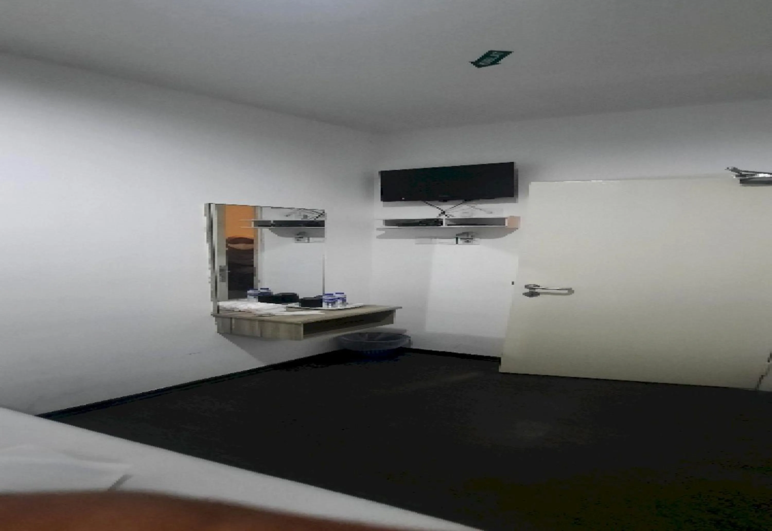 TV and multimedia in Super OYO 90724 Rg Hotel