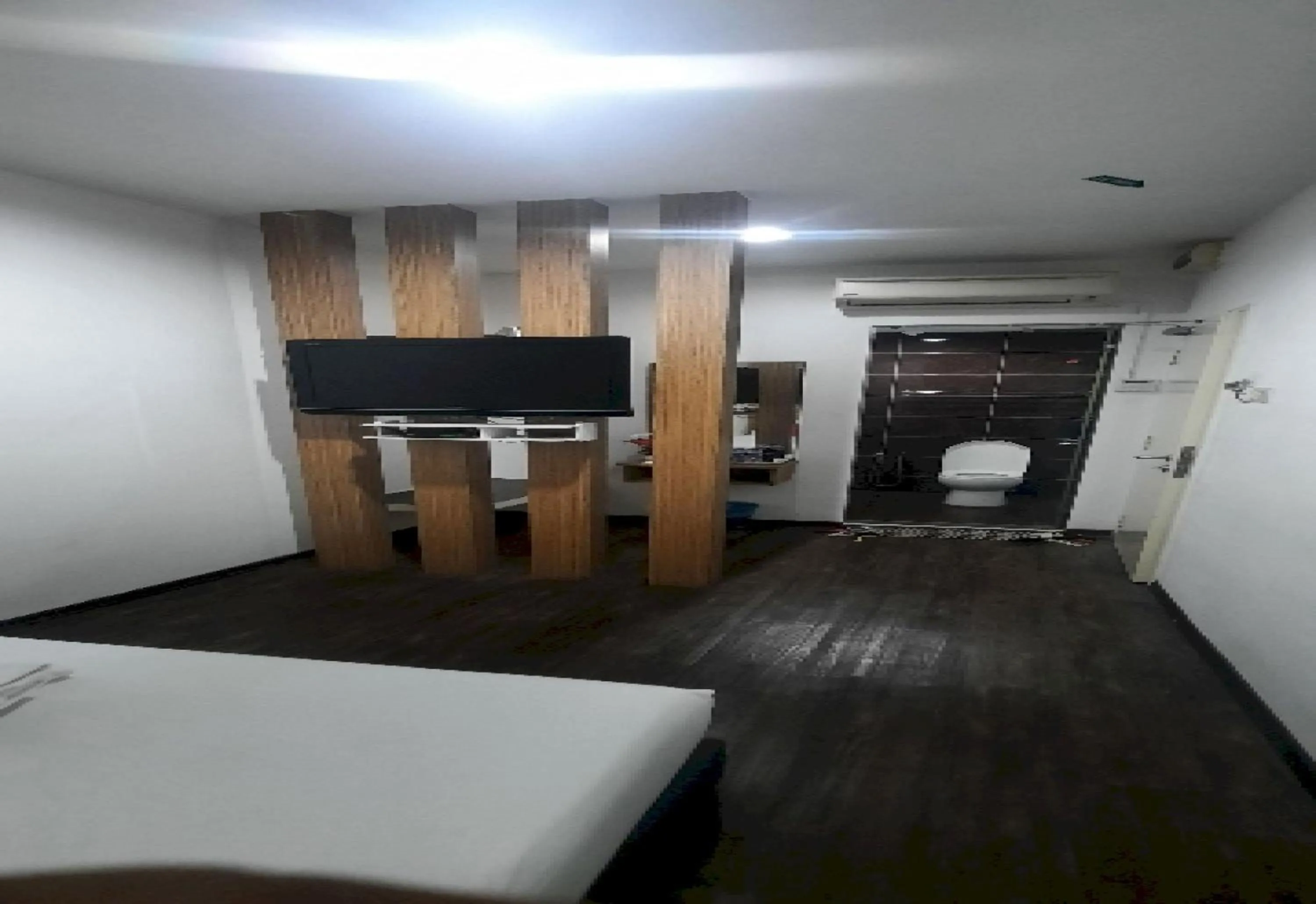 Photo of the whole room in Super OYO 90724 Rg Hotel