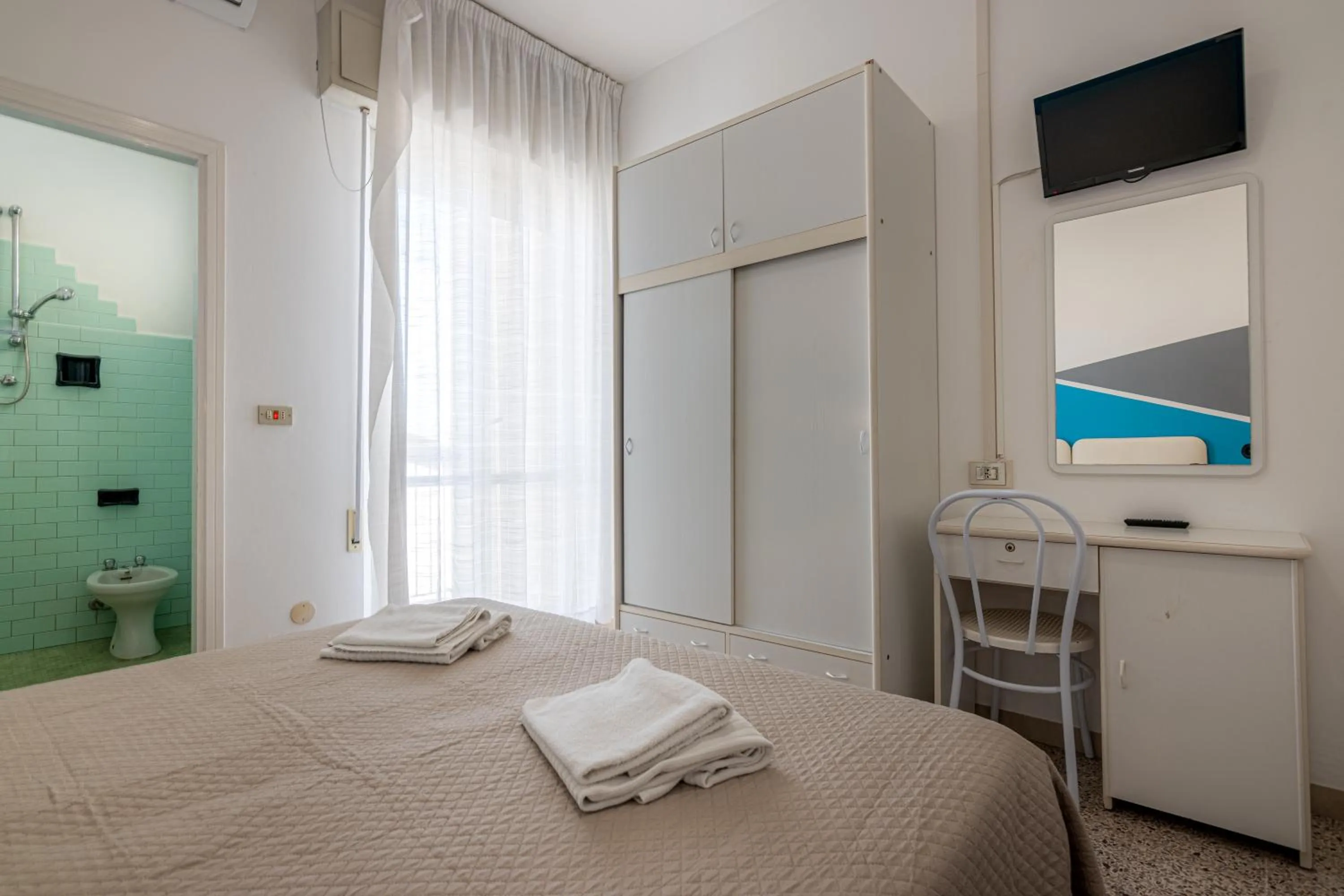 Bed in Hotel Serafini