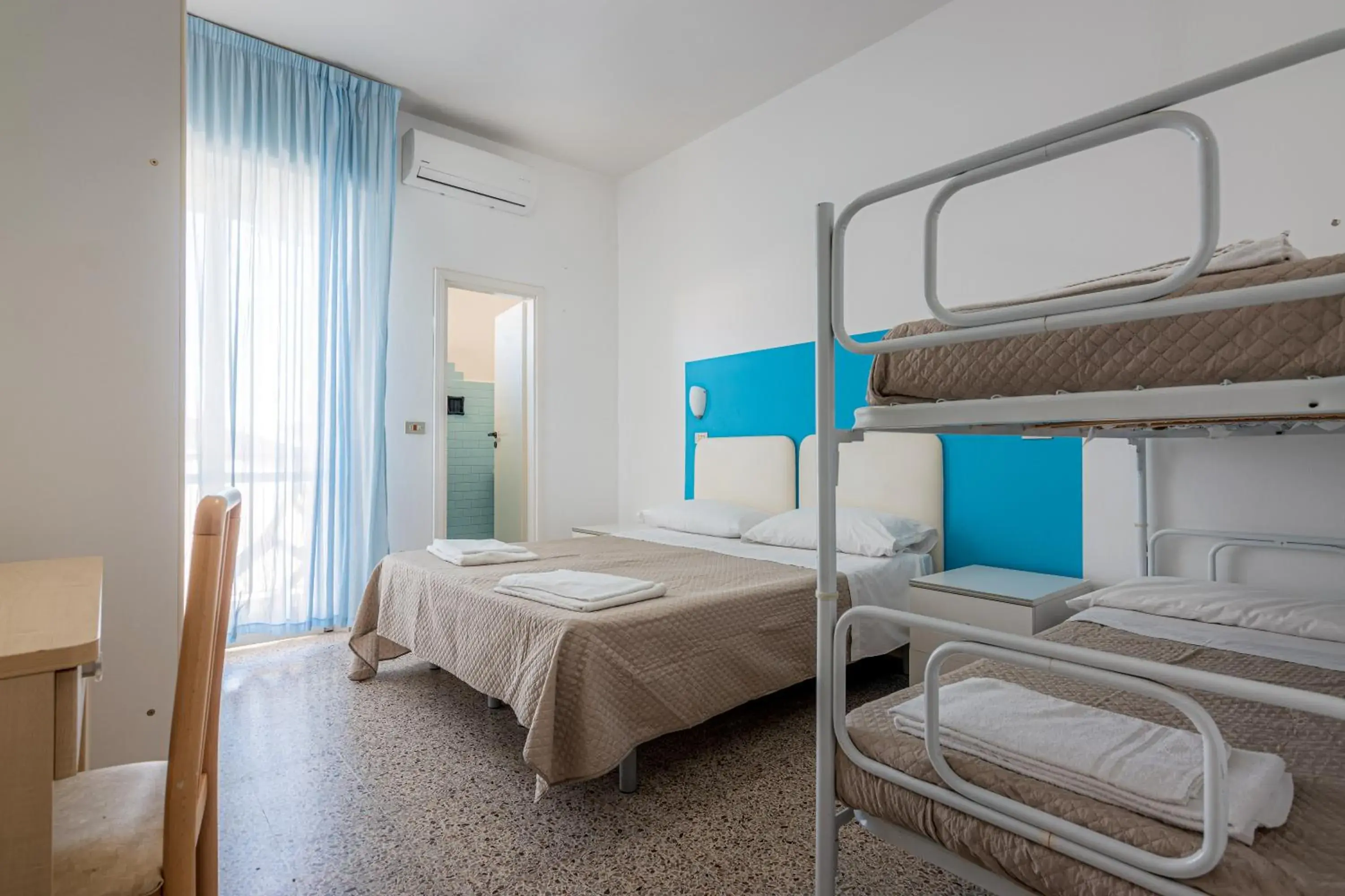 Quadruple Room in Hotel Serafini Quadruple Room in Hotel Serafini