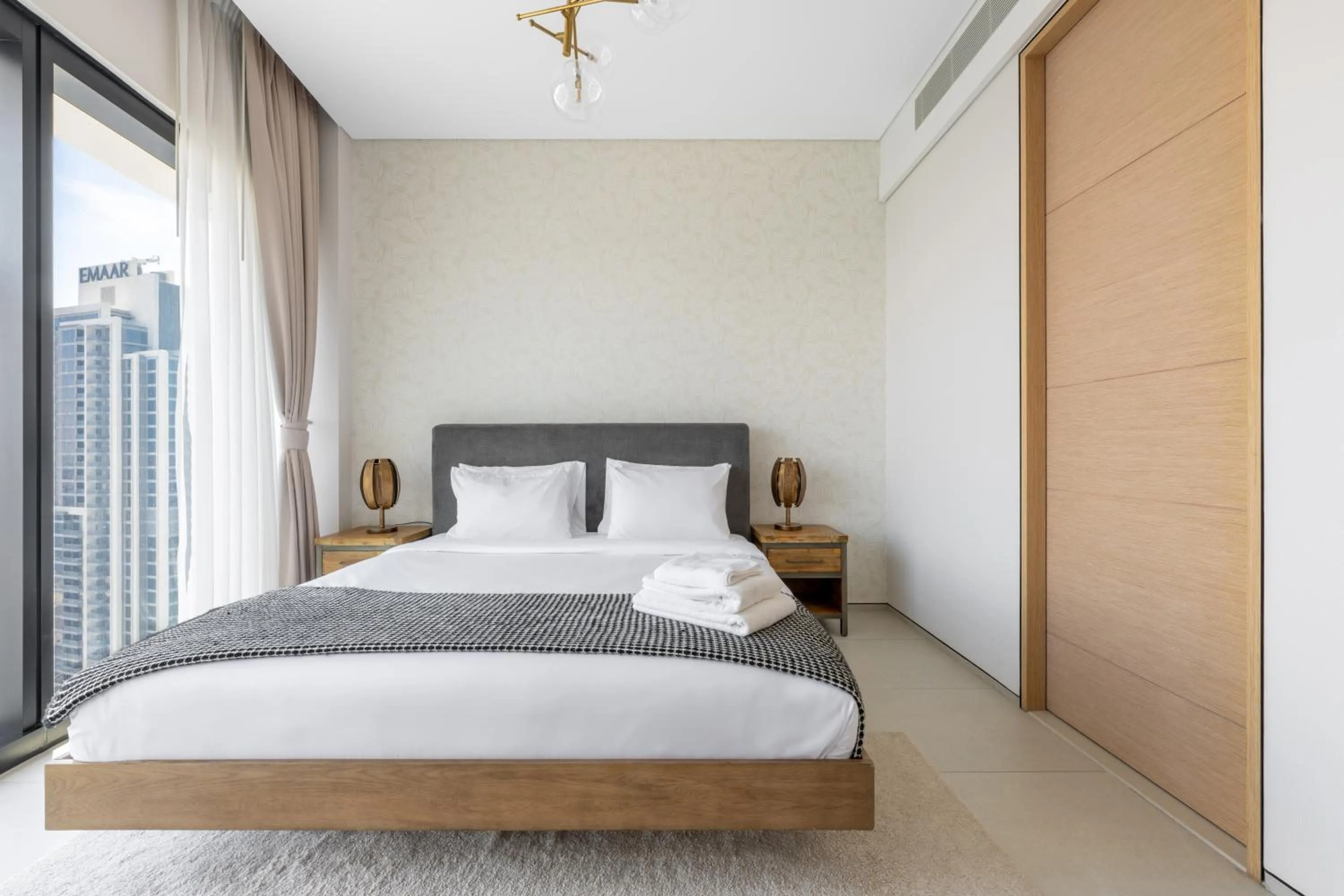 Bed in Jumeirah Gate Tower JBR 1BR Apartment