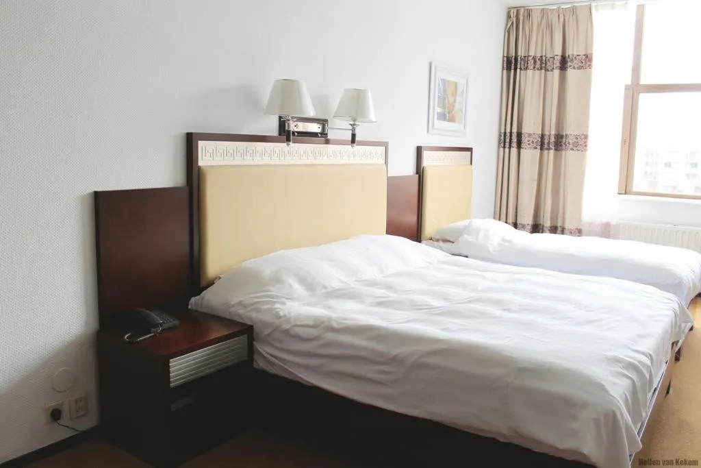 Triple Room in New Ocean Paradise Hotel