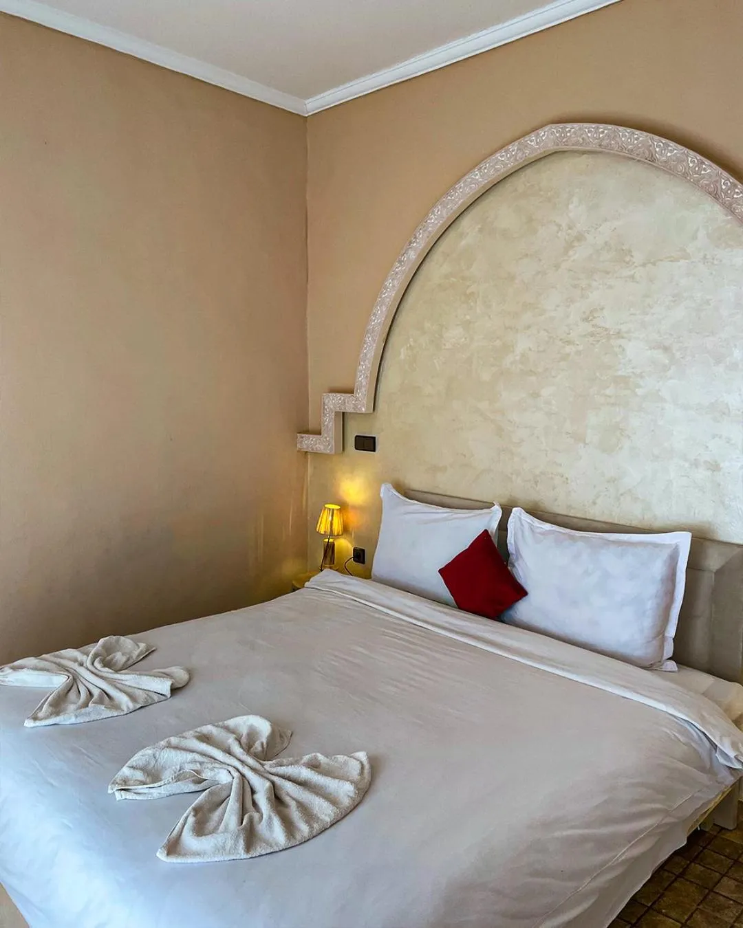 Bed in Whisper Hotel