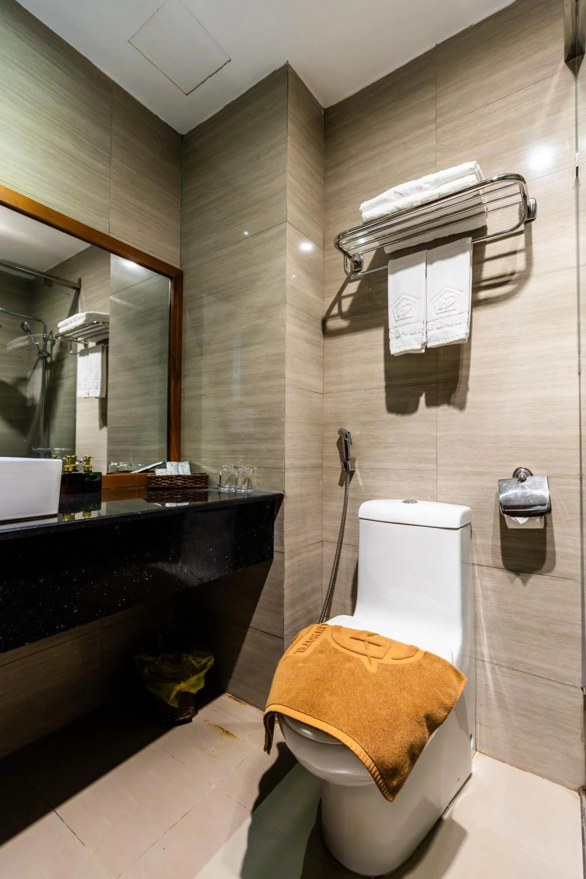 Shower in Golden Sun Apartment by New Sky Travel
