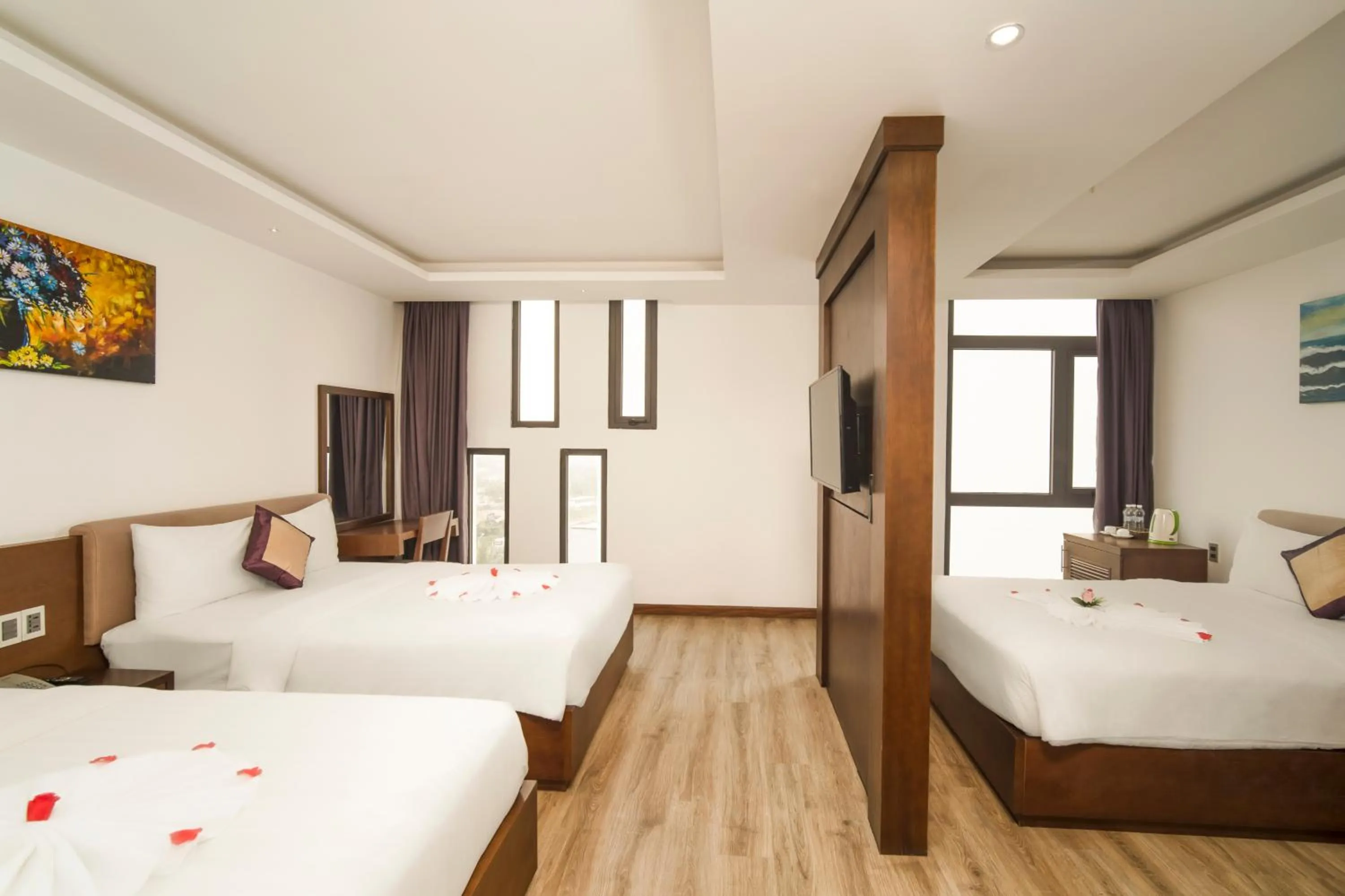 Bed in Golden Sun Apartment by New Sky Travel