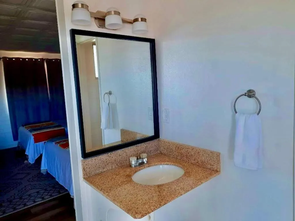 Bed in Canyon's Edge Route 66 Motel