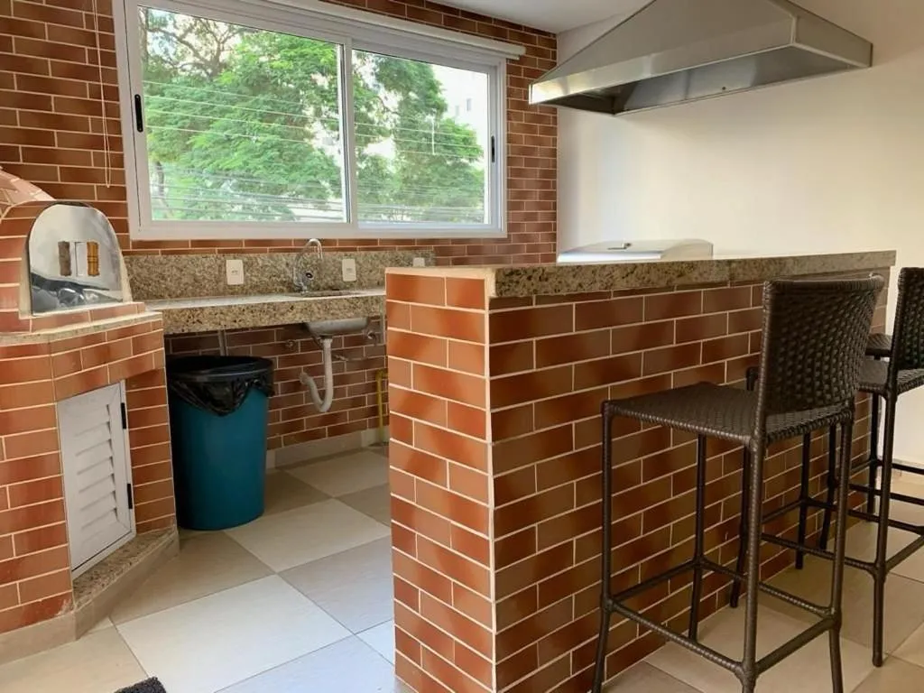 BBQ facilities in Seu Refúgio Perfeito no alto do Bueno