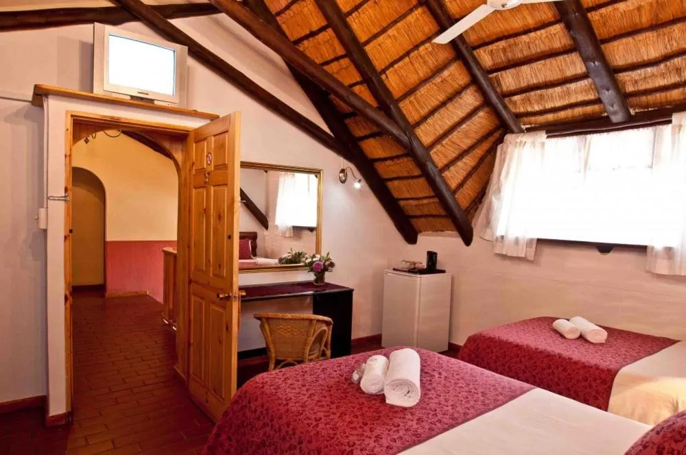 Bed in Woodpecker Inn