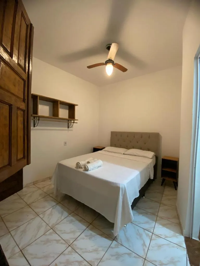 Bed in Pousada Caminho do Ribeirão