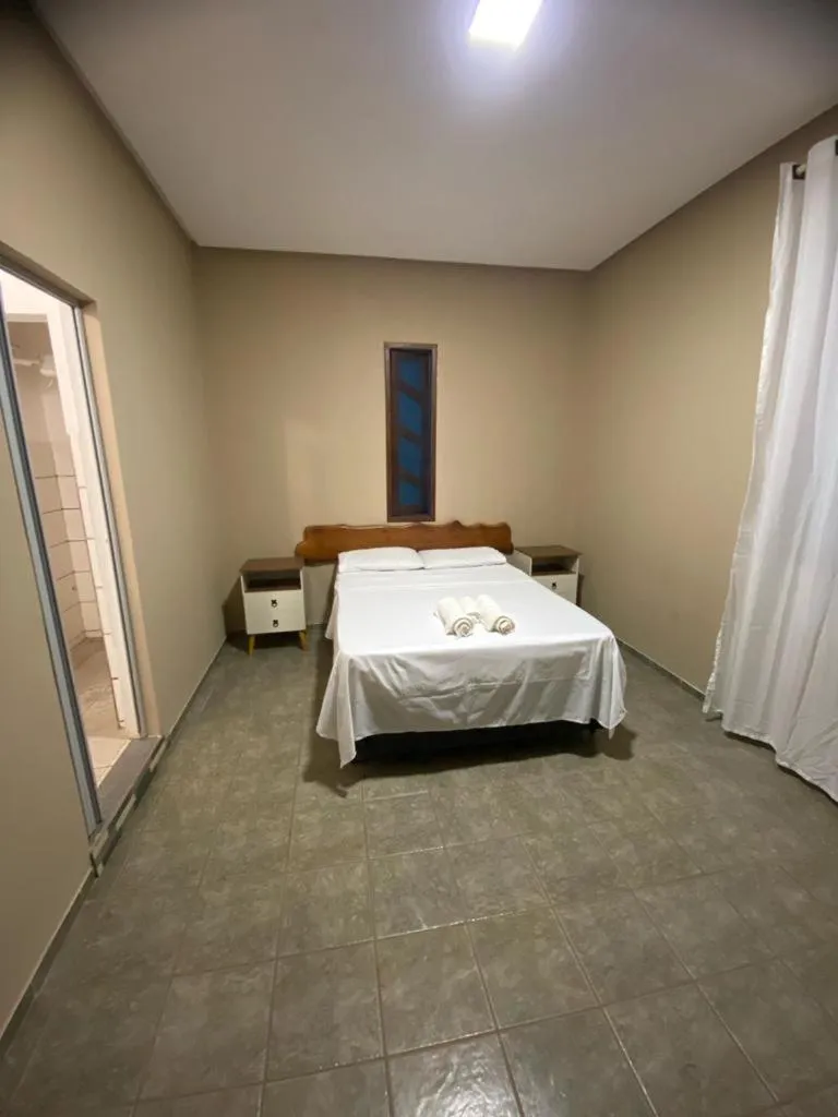 Bed in Pousada Caminho do Ribeirão