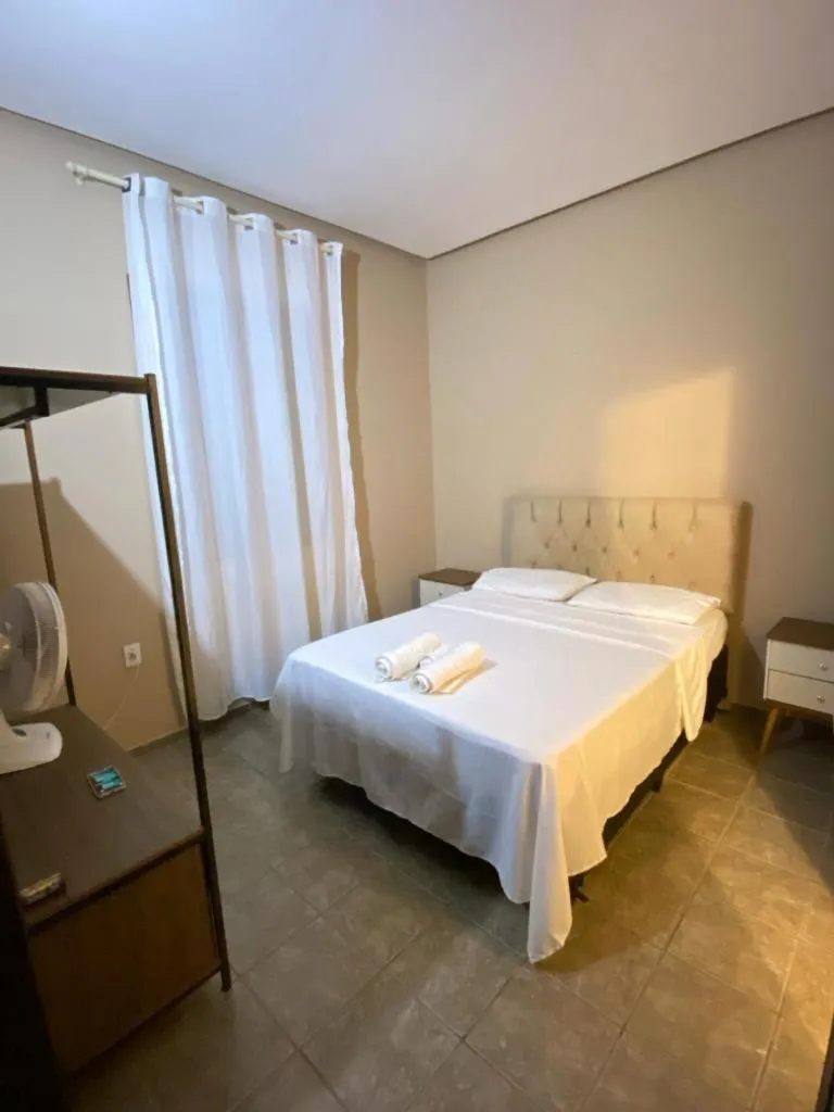 Bed in Pousada Caminho do Ribeirão