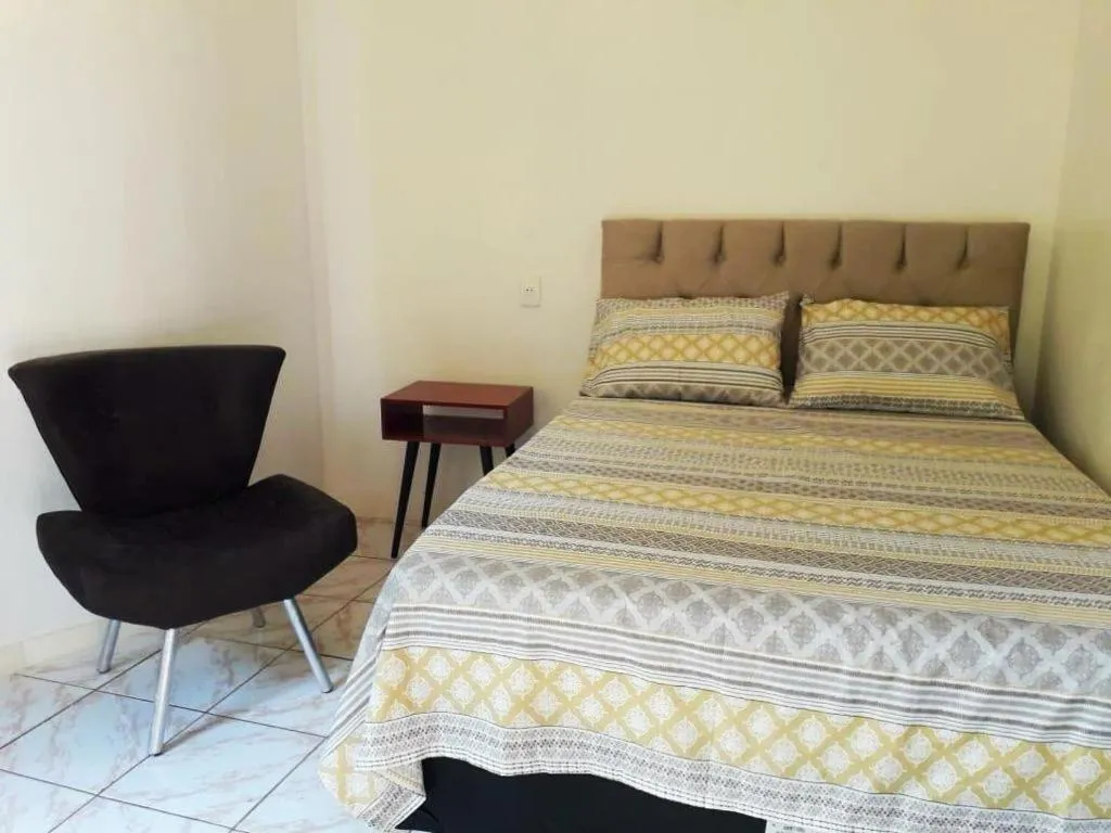 Bed in Pousada Caminho do Ribeirão