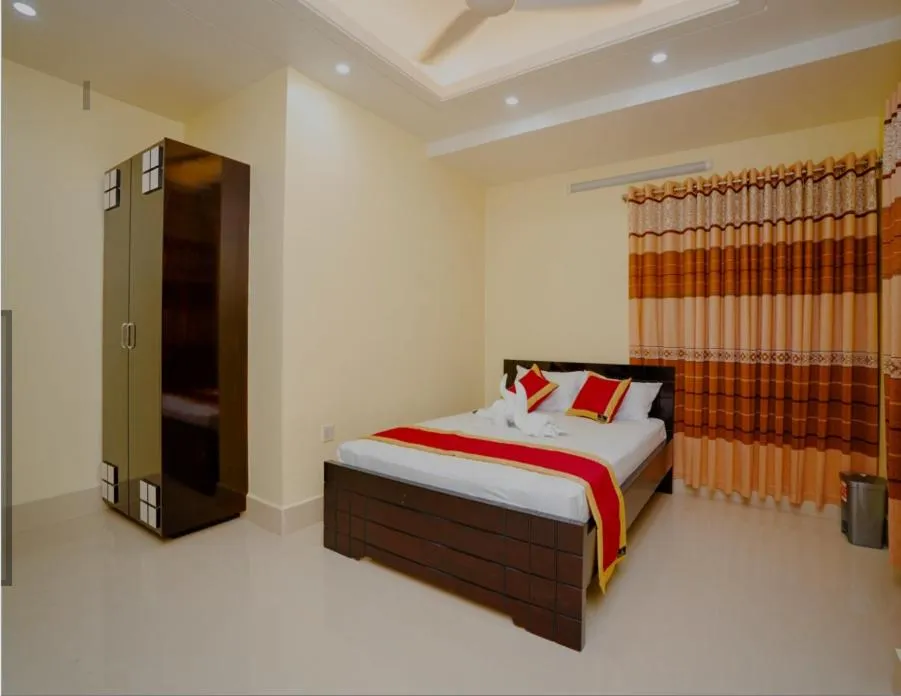 Bed in Adarsha Palace Hotel