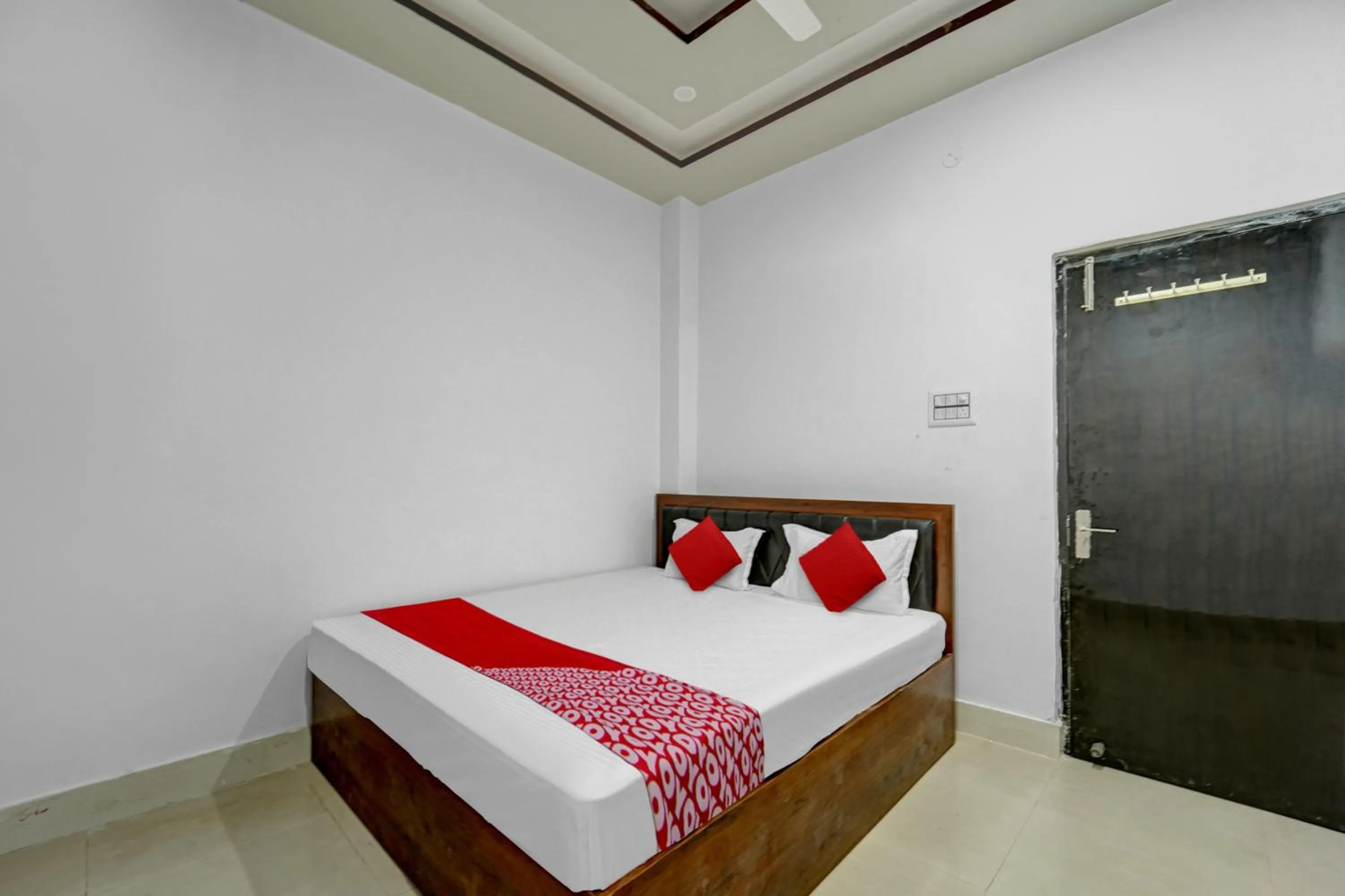 Bedroom, Bed in Super Hotel O Dev Laxmi Palace Hotel & Banquet