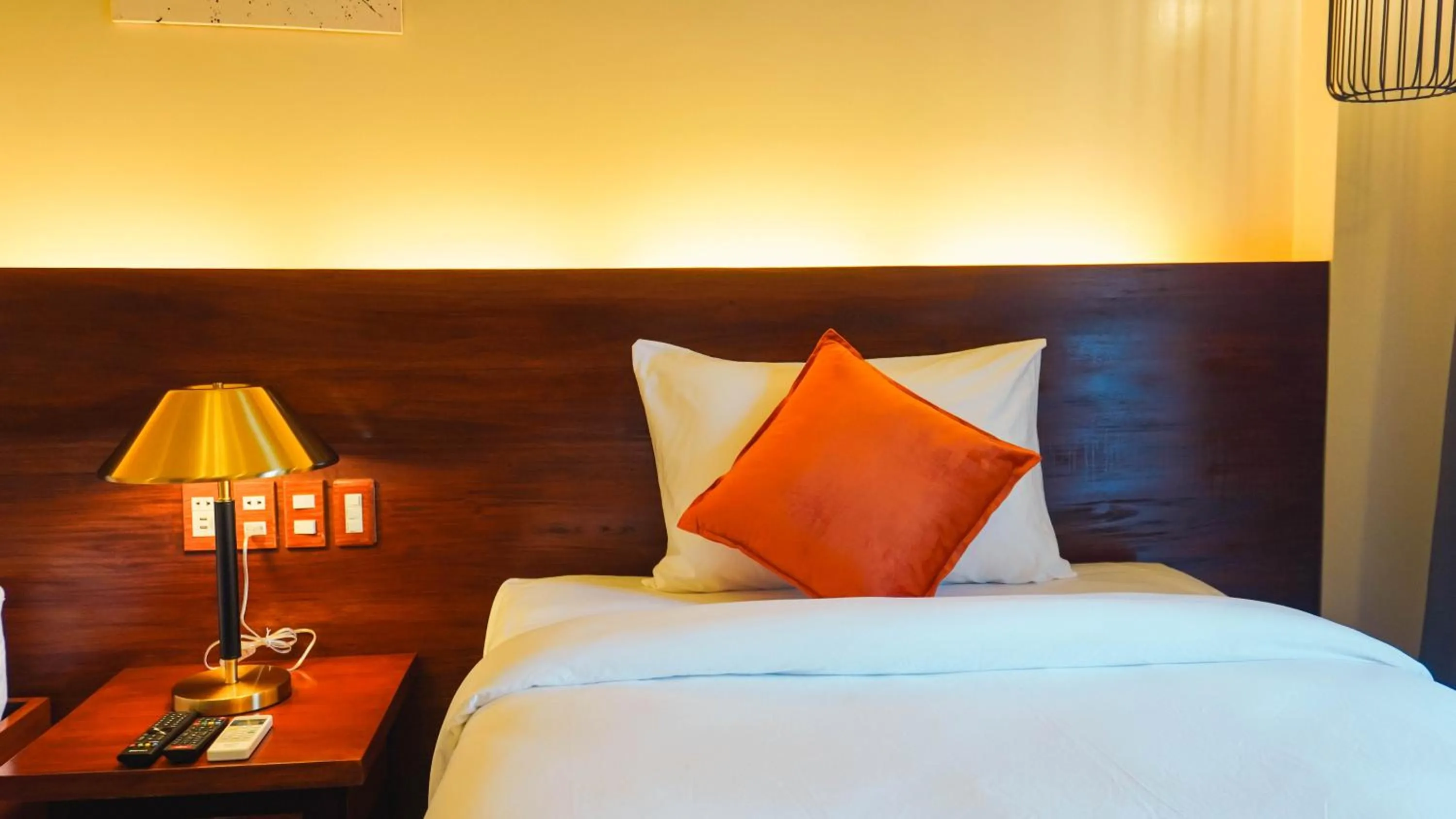 Bed in UNWND Boutique Hotel Camiguin