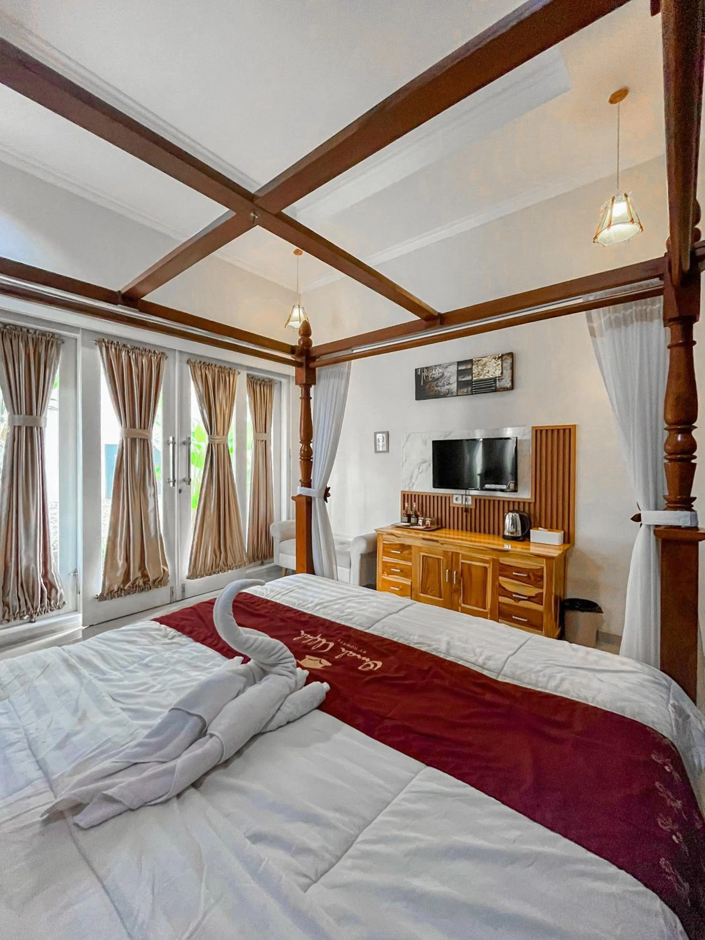 TV and multimedia, Bed in Omah Ulfah Homestay