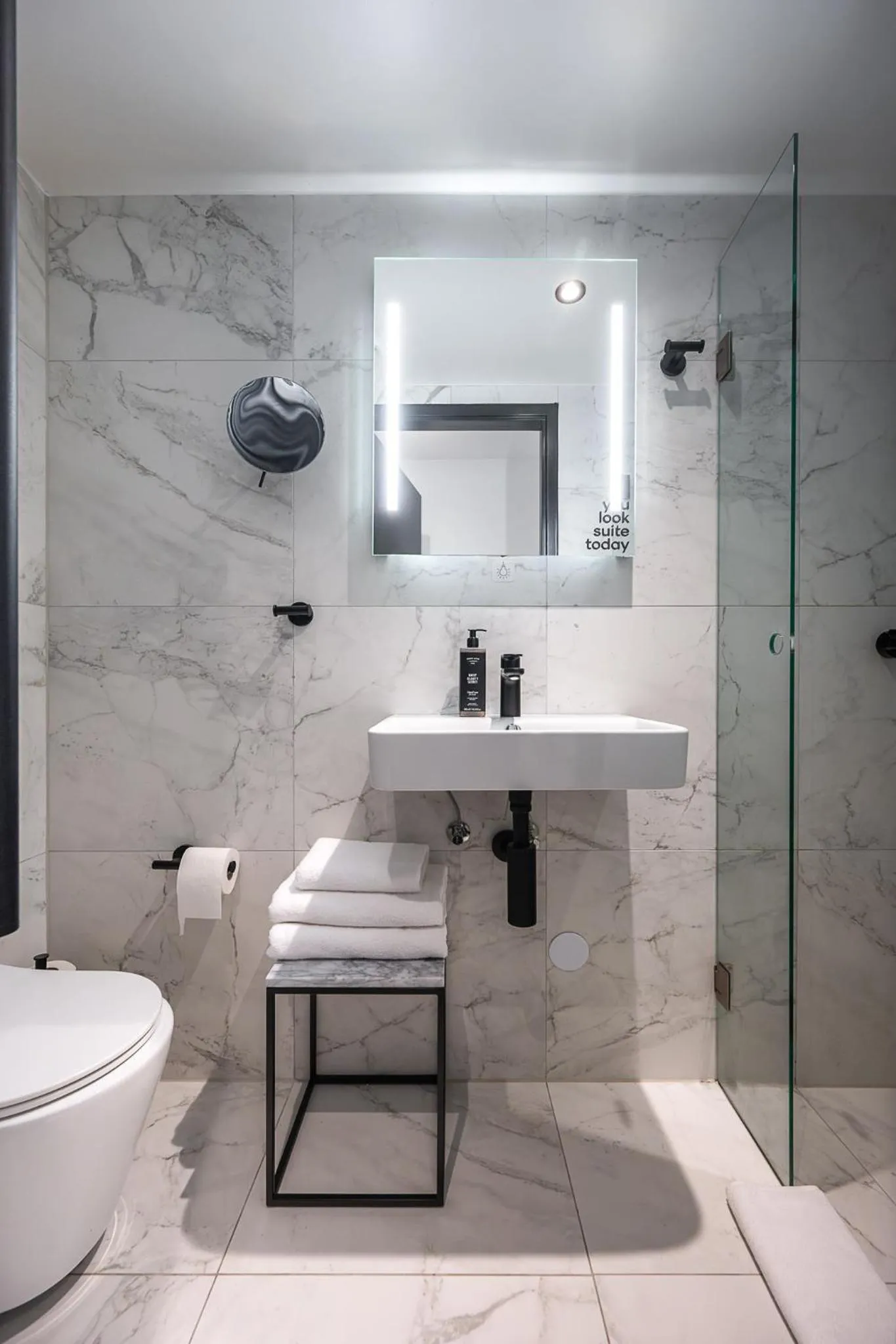 Shower in Limehome Amsterdam Leidsekruisstraat