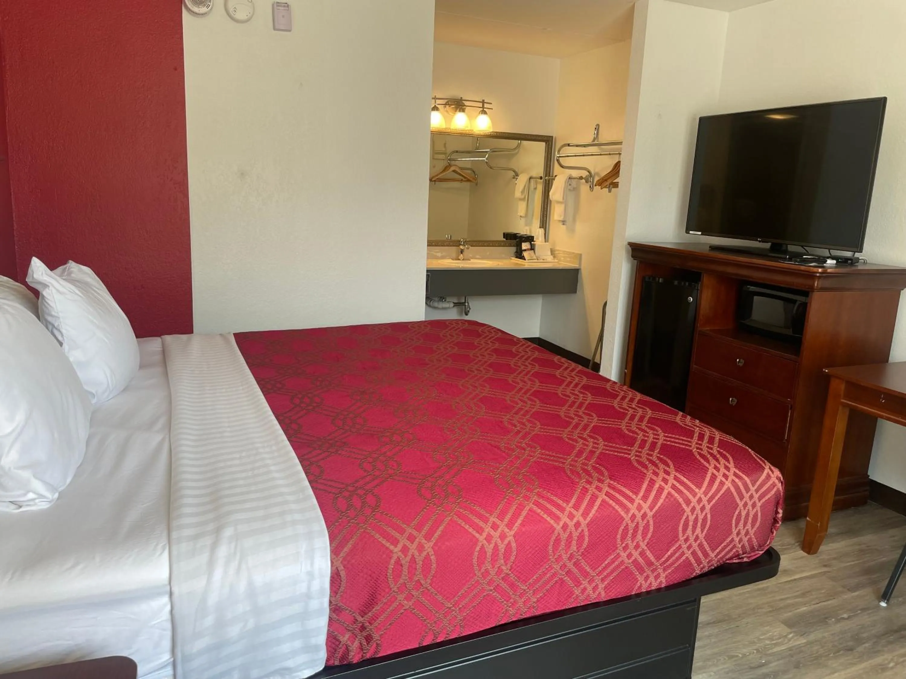 Bed in Ramada by Wyndham Branson Theatre District