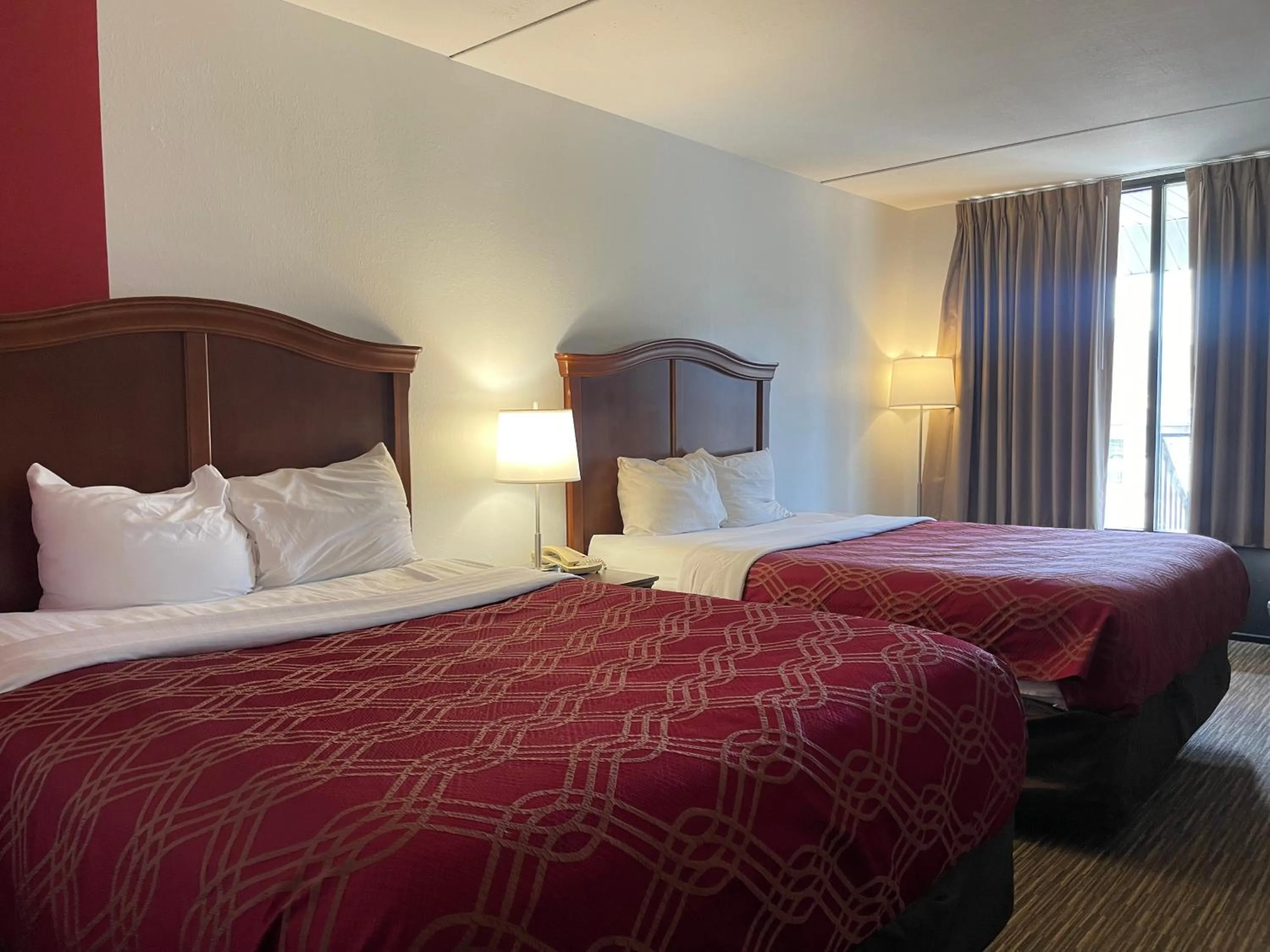 Bedroom in Ramada by Wyndham Branson Theatre District