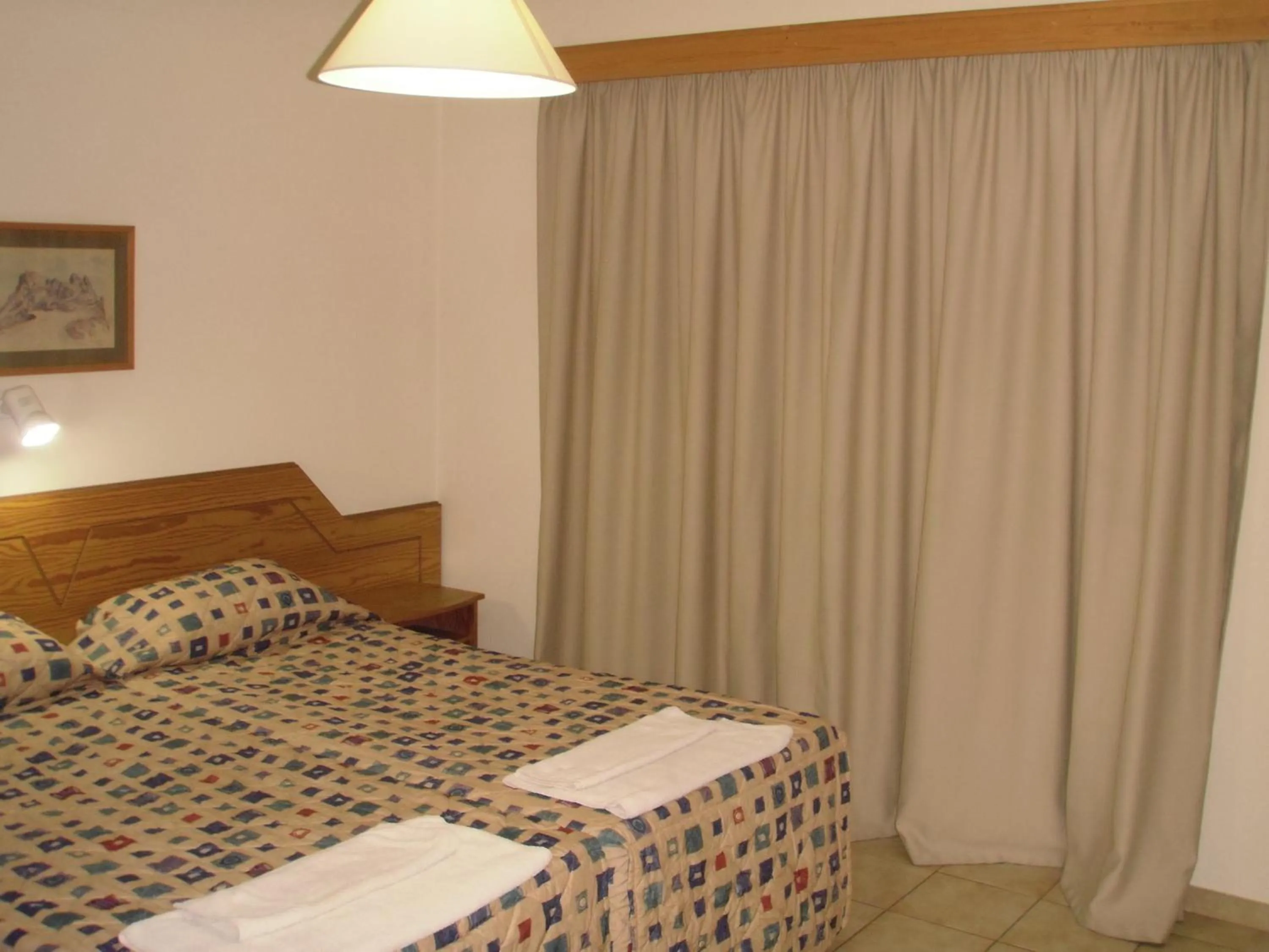 Bed in Eligonia Hotel Apartments