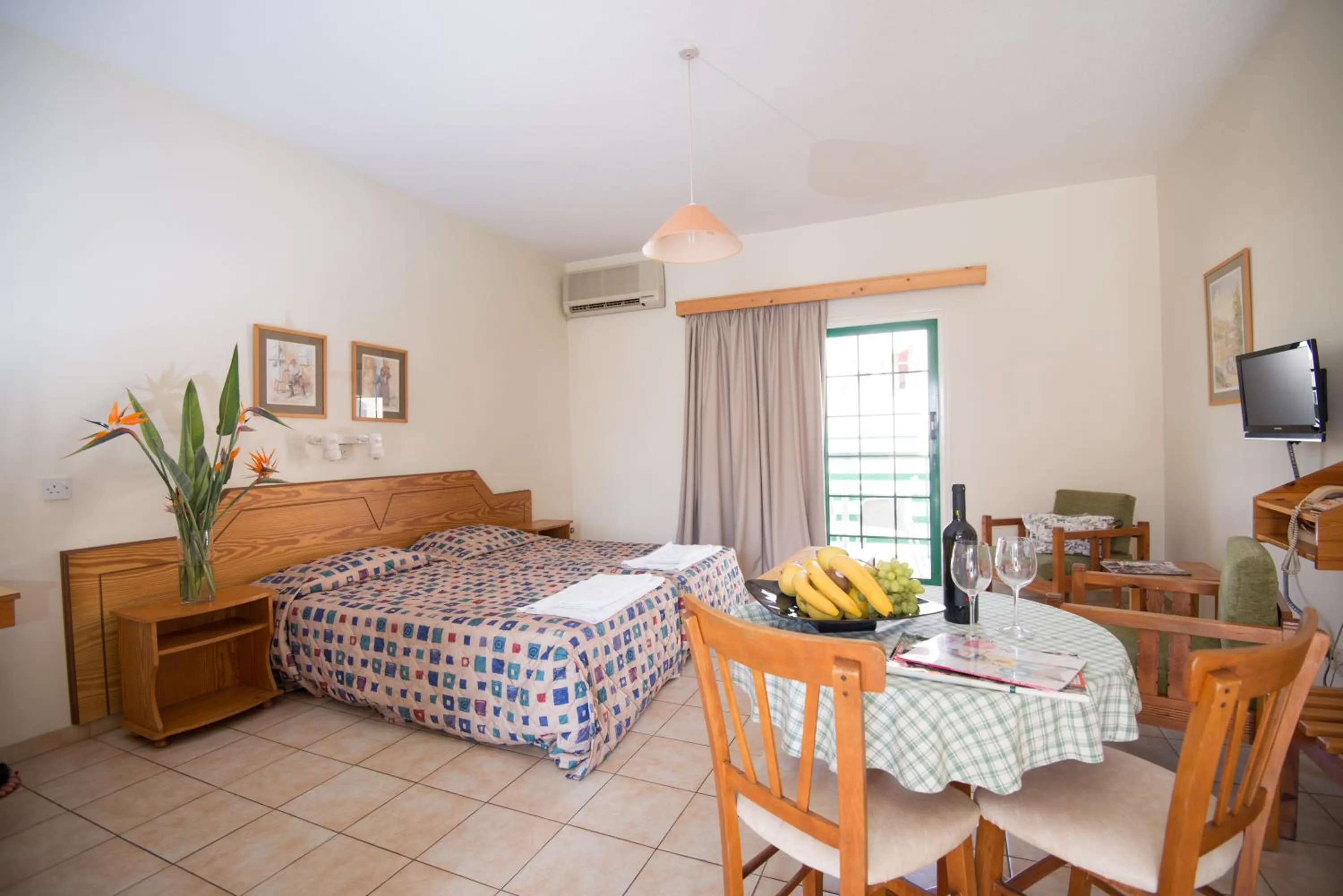 Bed in Eligonia Hotel Apartments