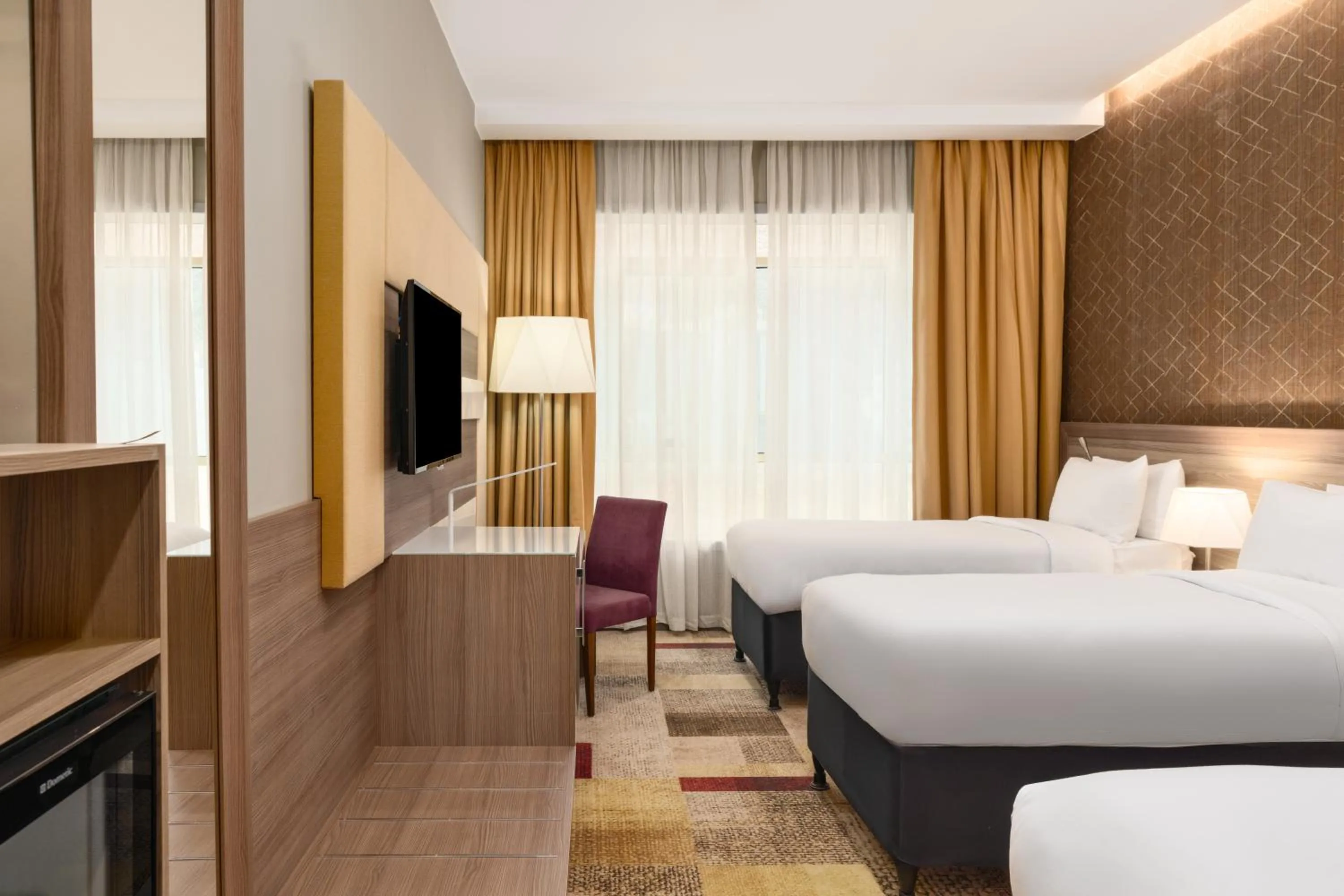 Bed in Mercure Makkah Aziziah