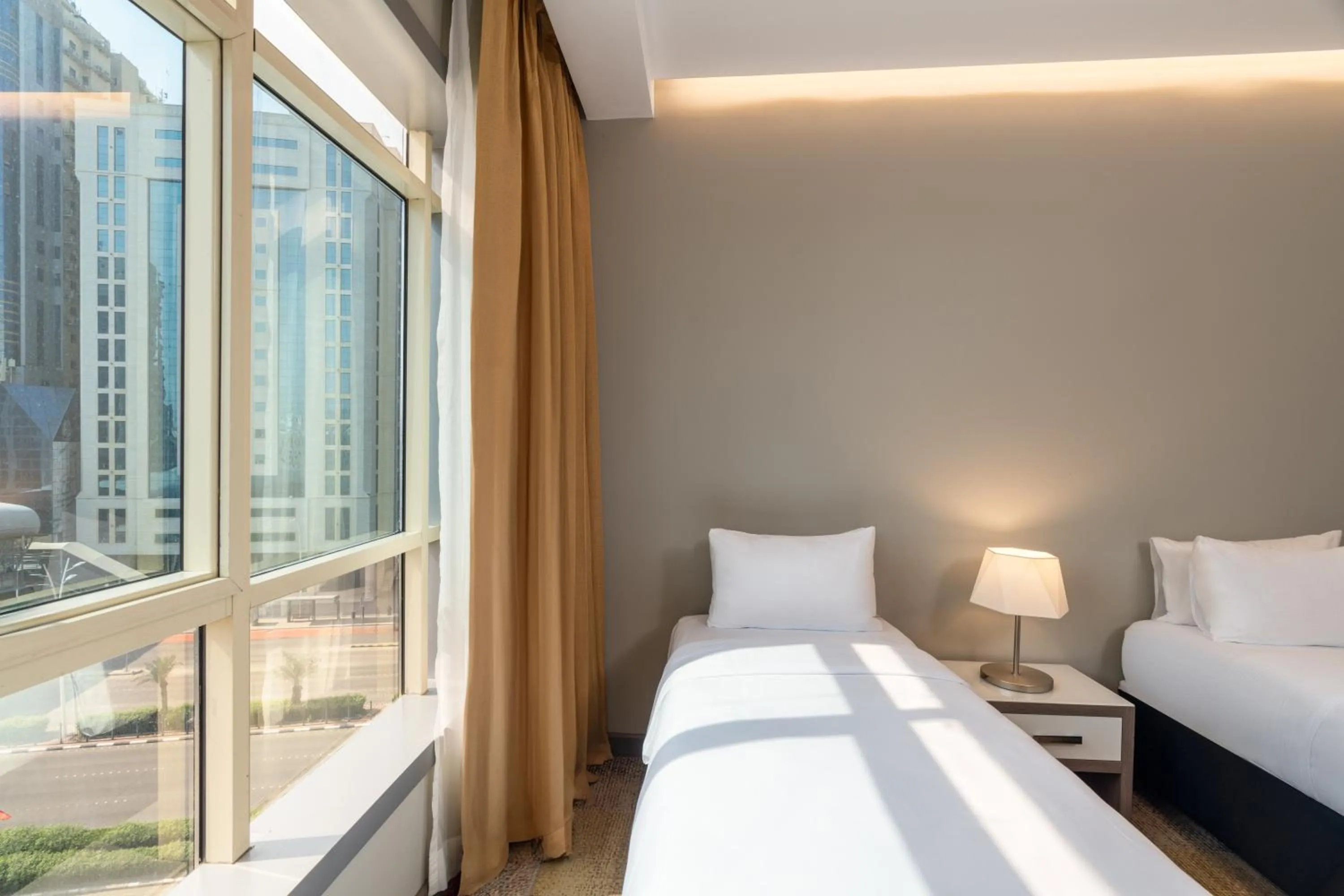 Bed in Mercure Makkah Aziziah