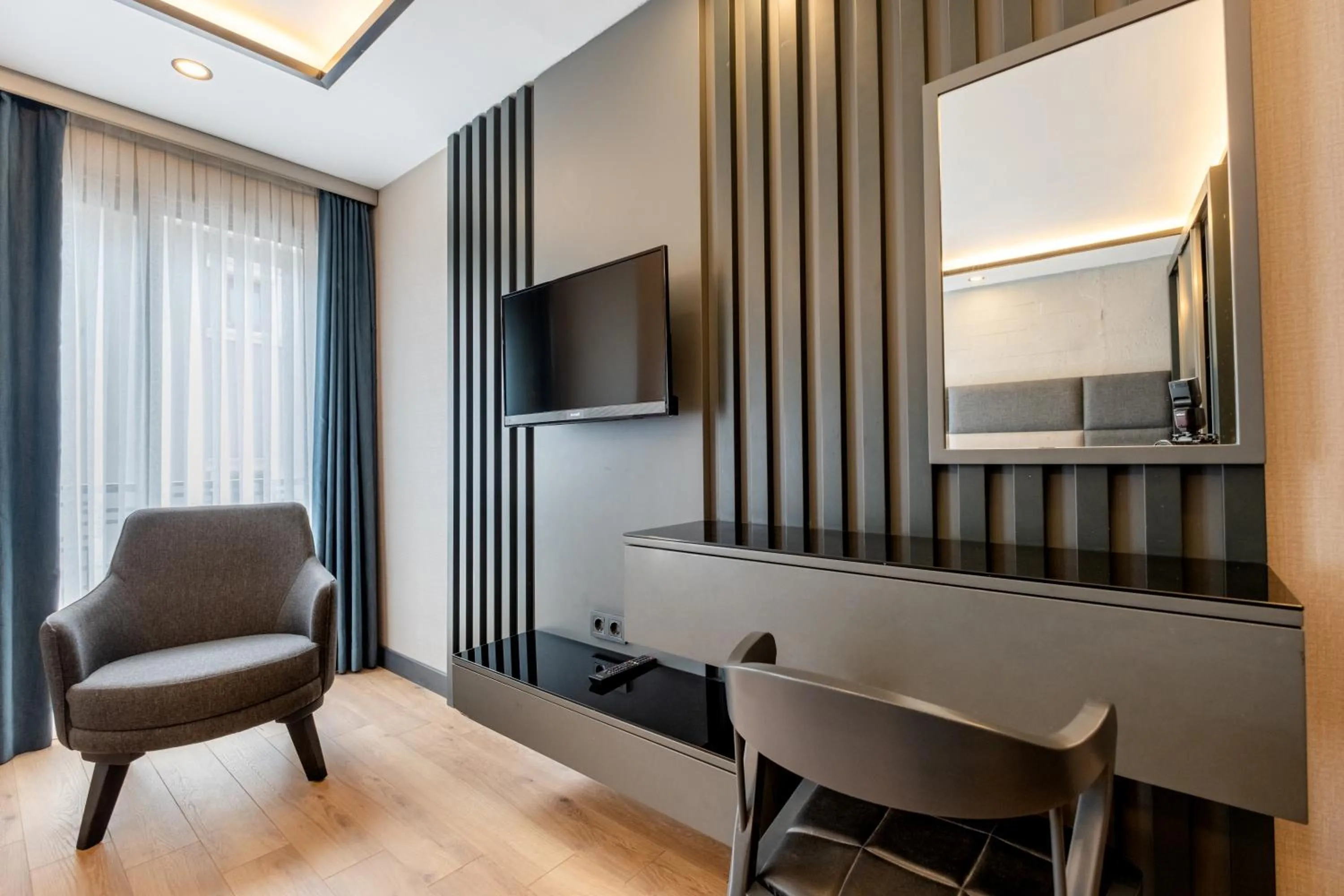 TV and multimedia in The Row Suites Taksim