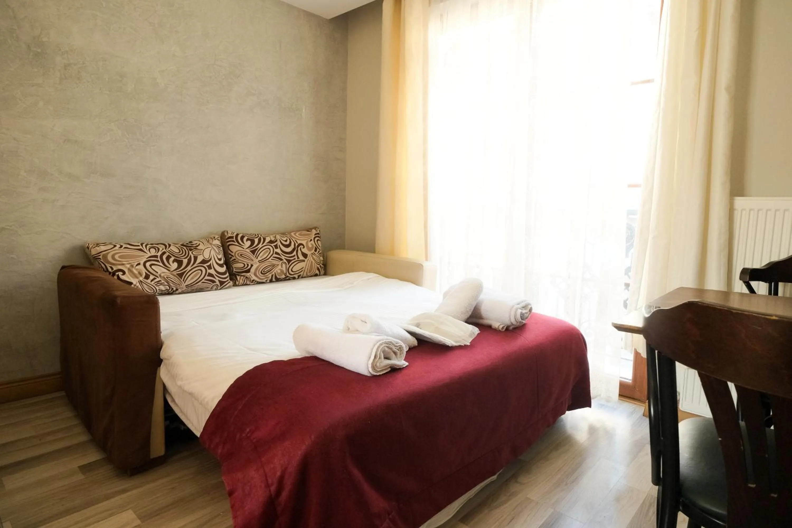 Seating area, Bed in Taksim Celebi Suites