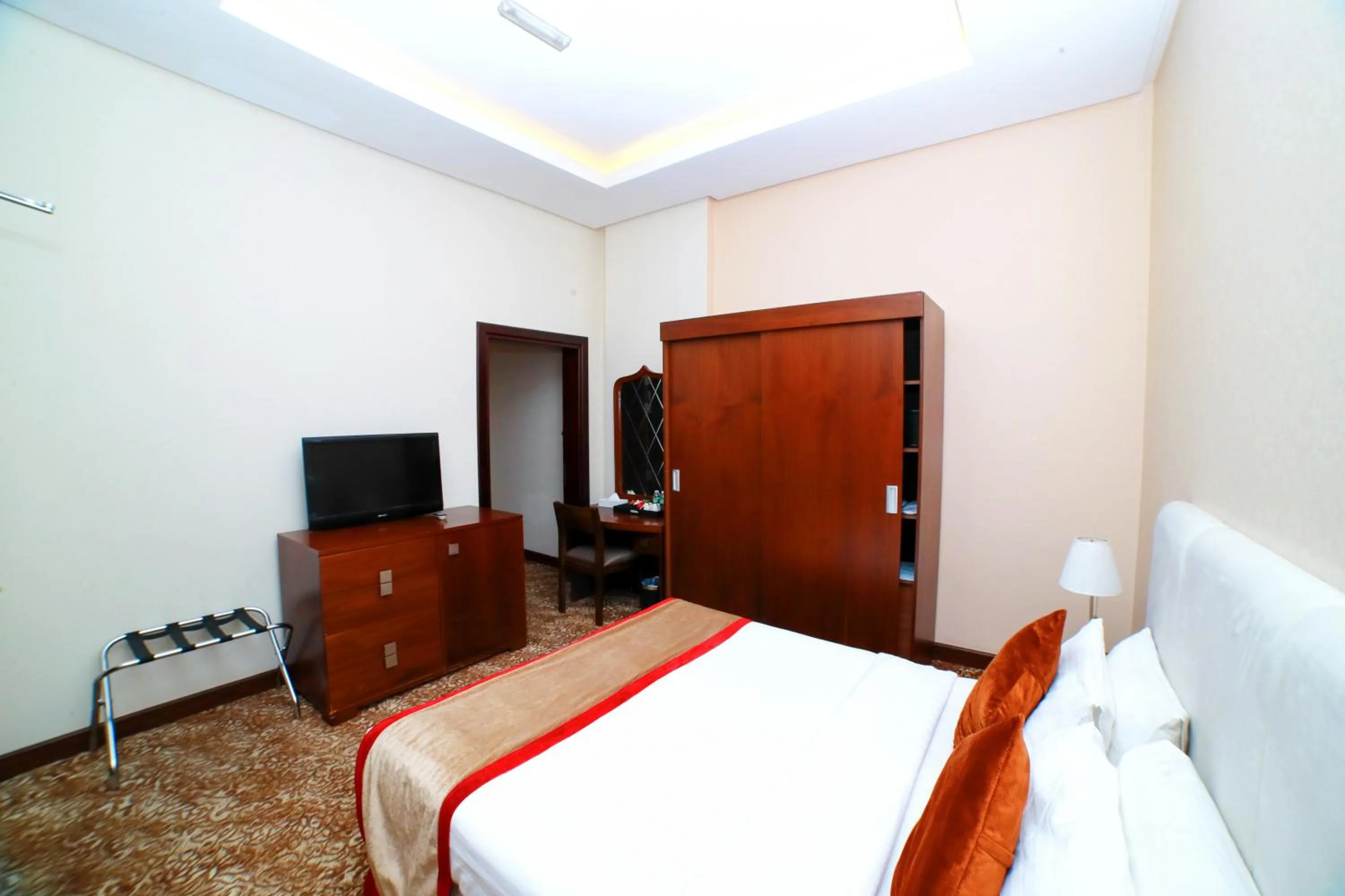 Bed in GREEN GARDEN HOTEL