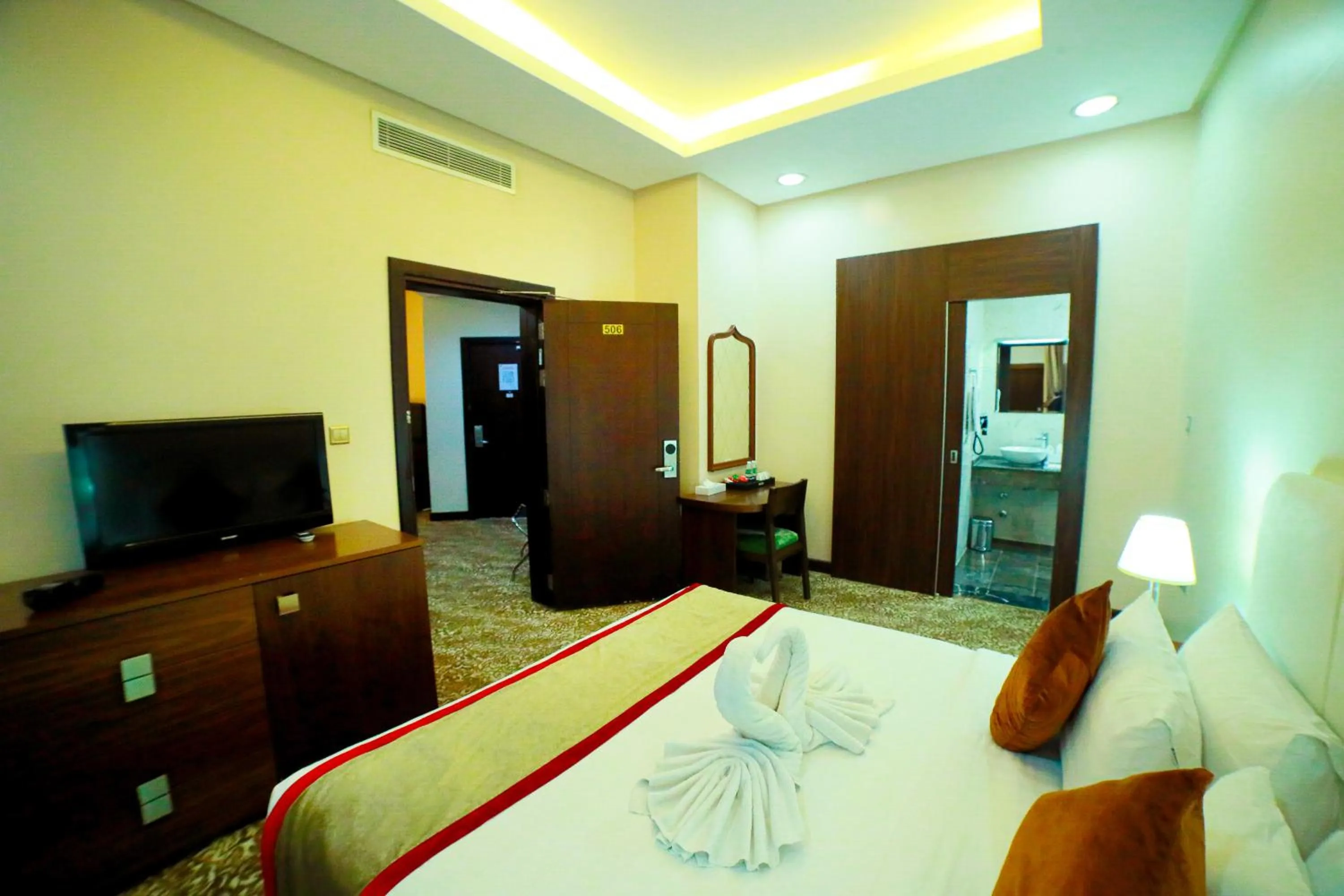 Bed in GREEN GARDEN HOTEL