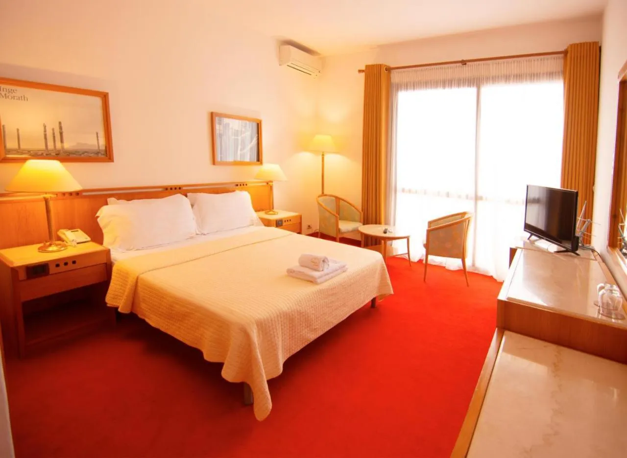 Bed in Chateau Linza Resort