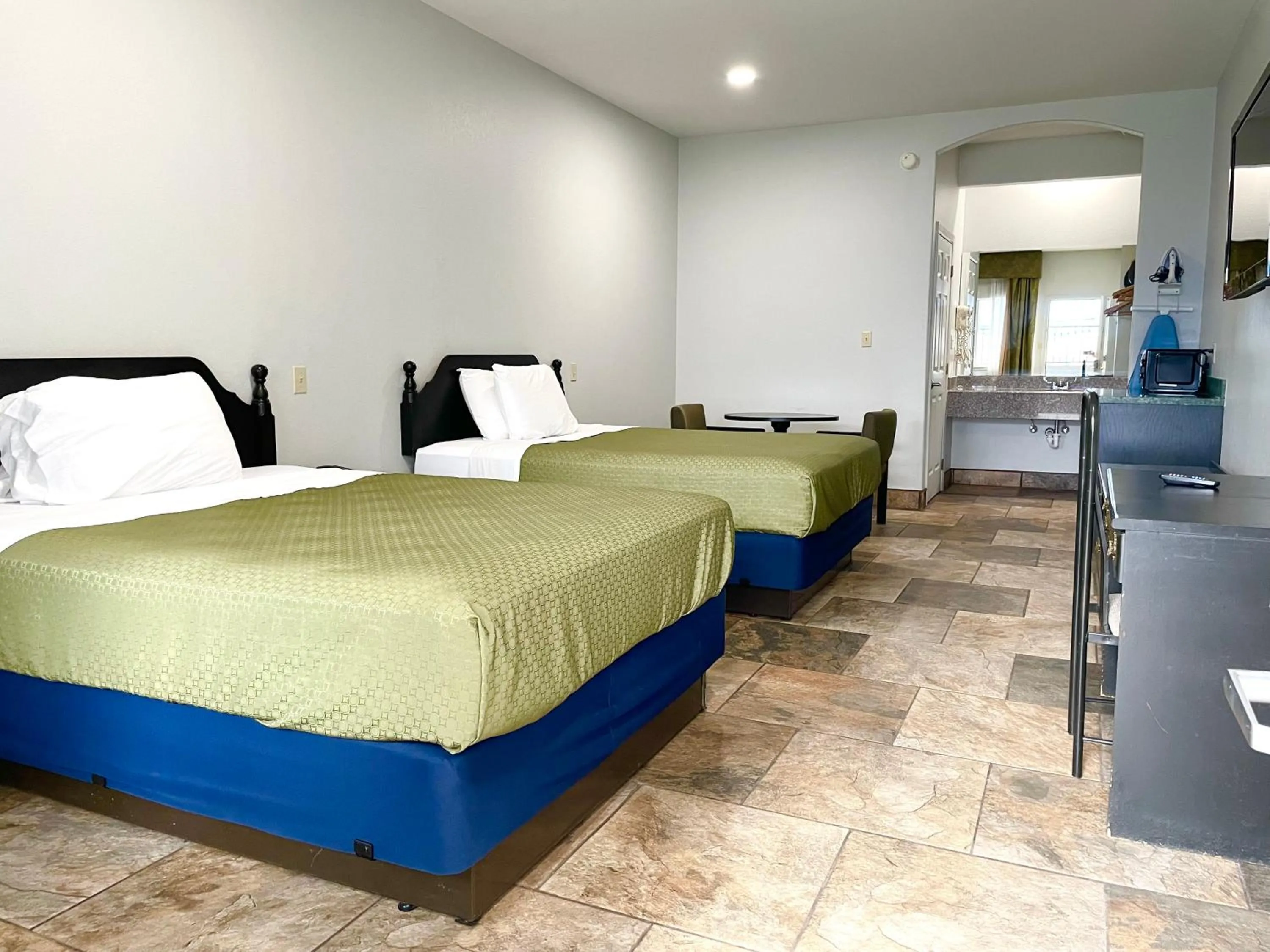 Bed in Texas Inn La Feria