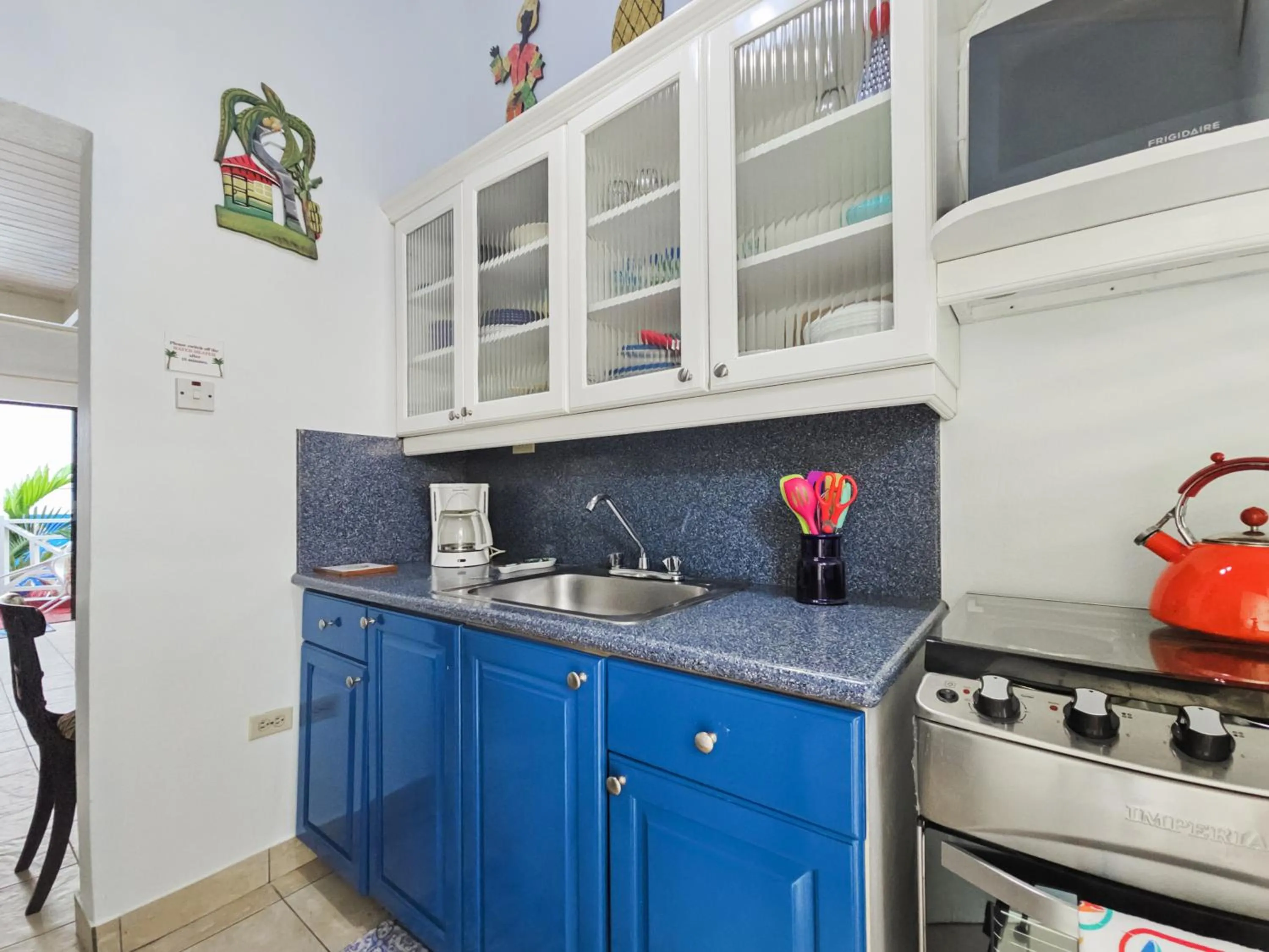 Kitchen or kitchenette in Chrisanns Paradise Suite by the Ocean - Apt#9