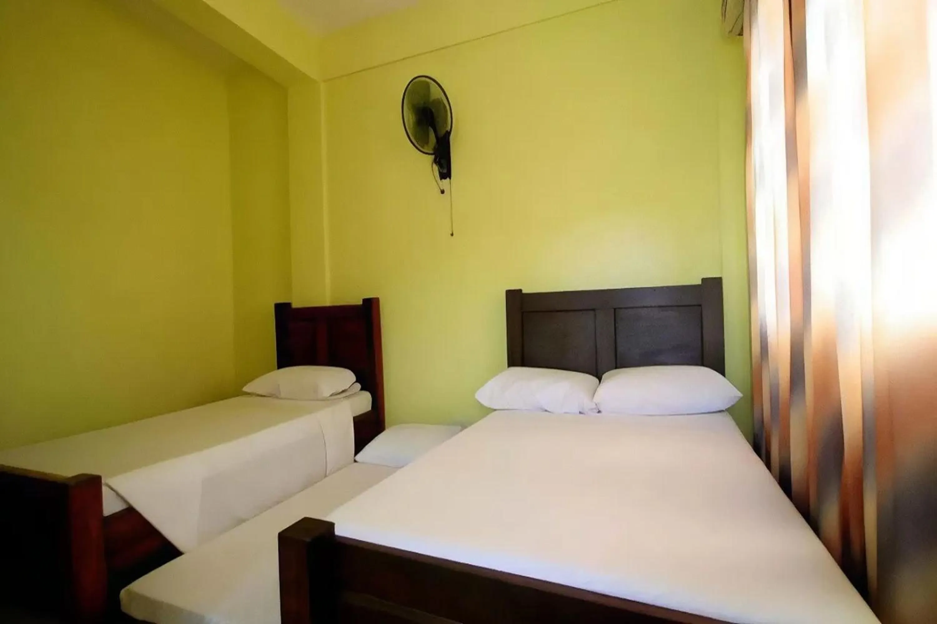 Bed in Luis Bay Travellers Lodge Coron