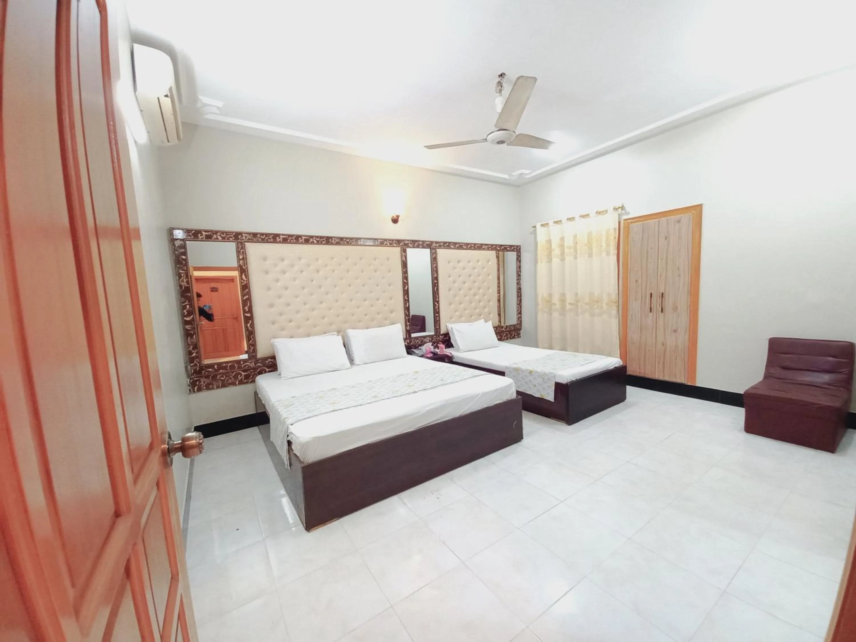 Bed in Rose Palace Guest House