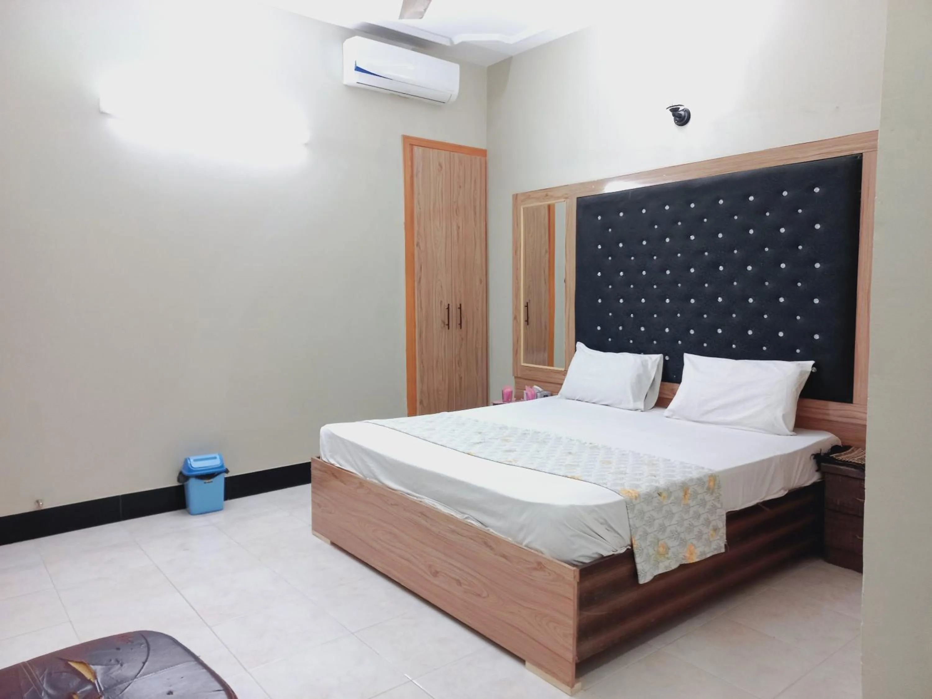 Bed in Rose Palace Guest House