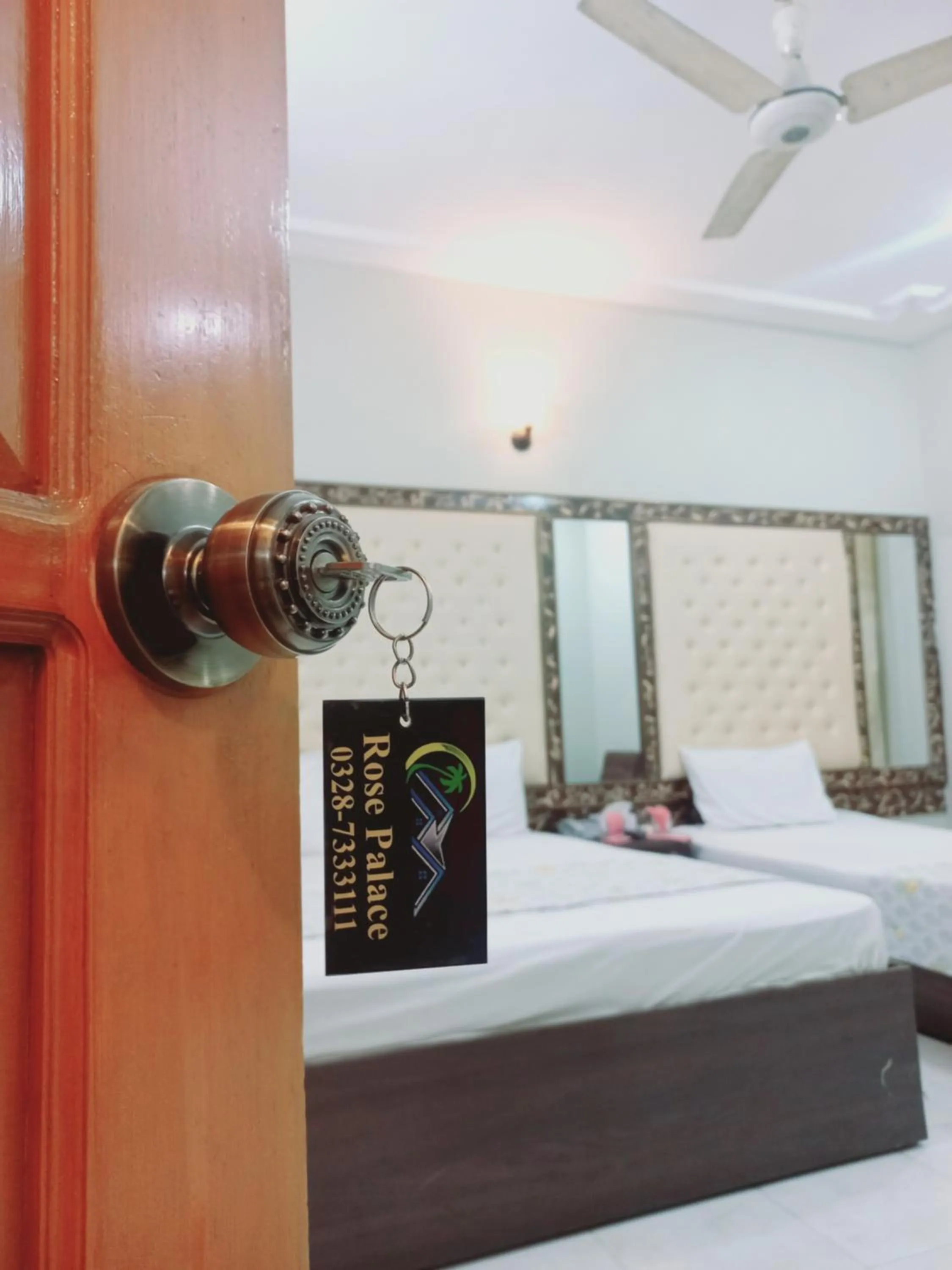 Bed in Rose Palace Guest House