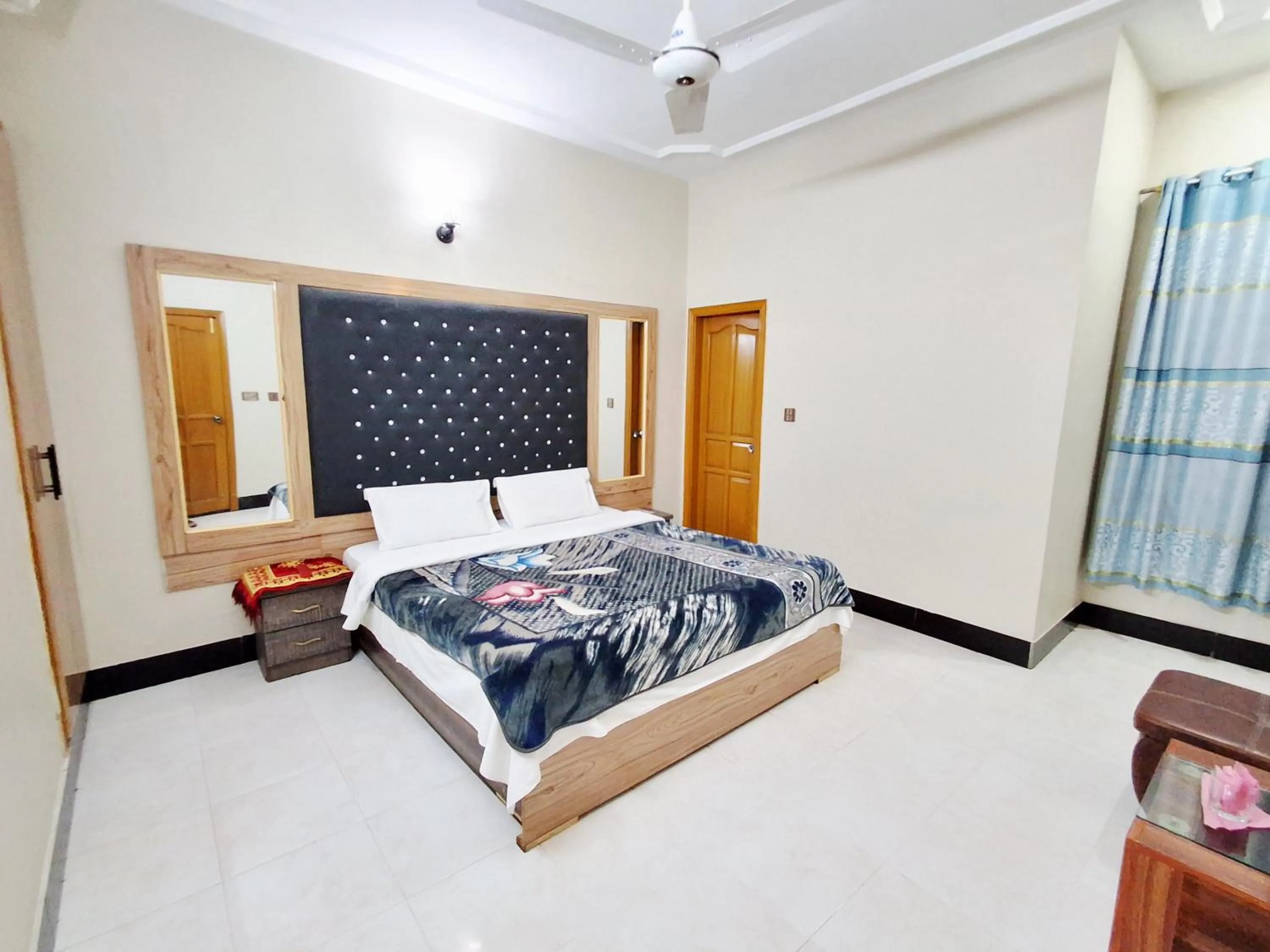 Bed in Rose Palace Guest House