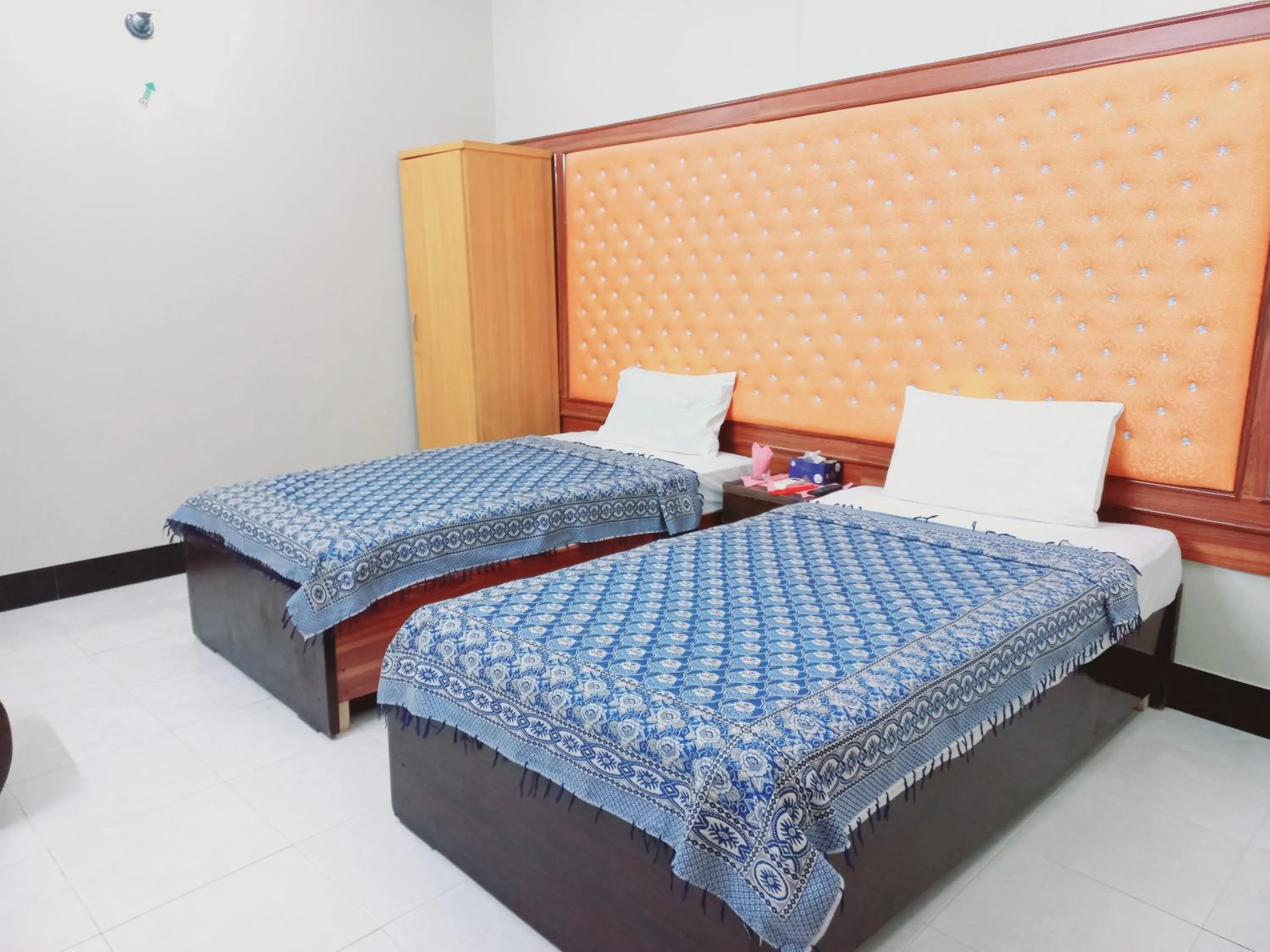 Bed in Rose Palace Guest House