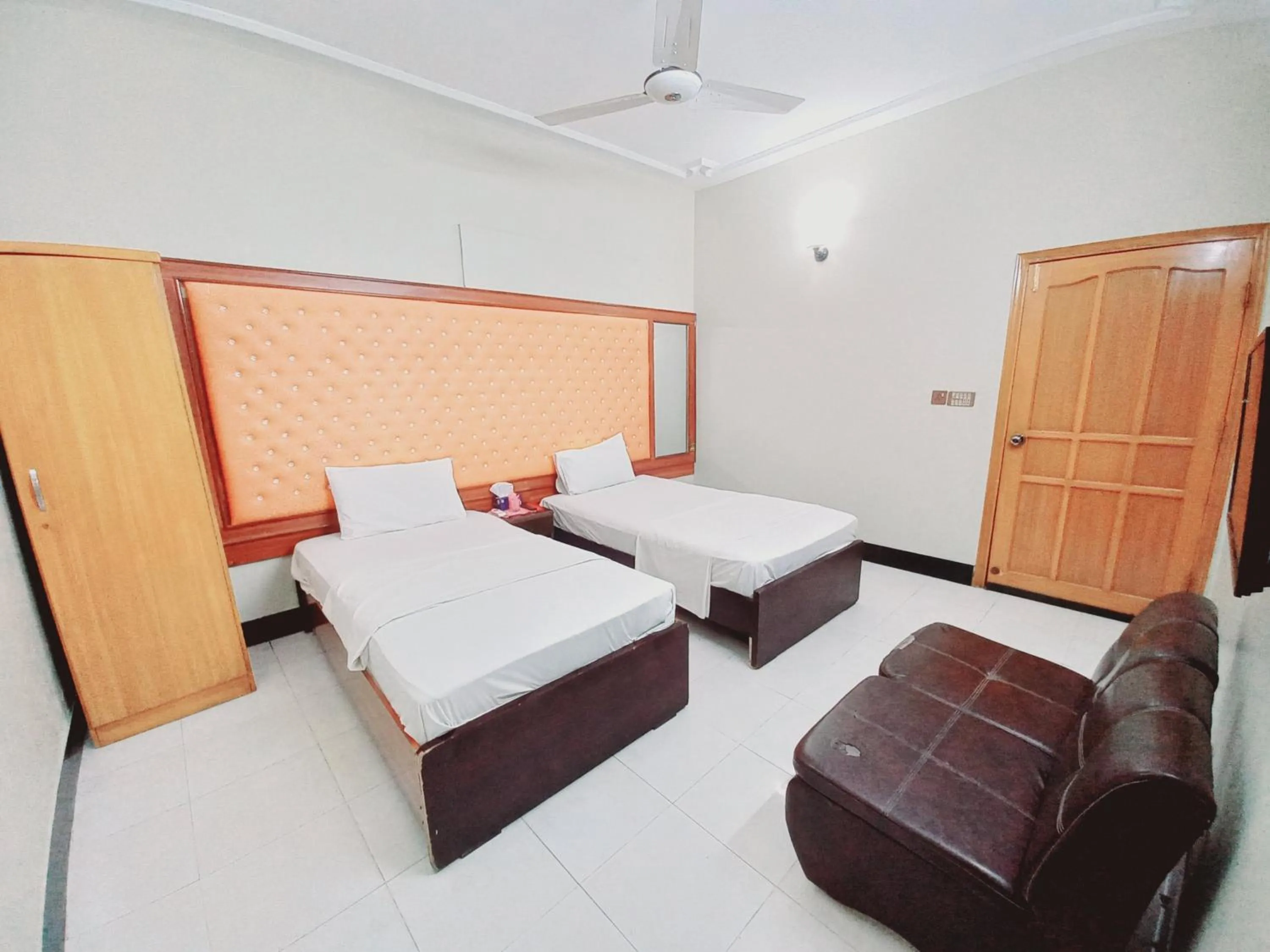 Bed in Rose Palace Guest House