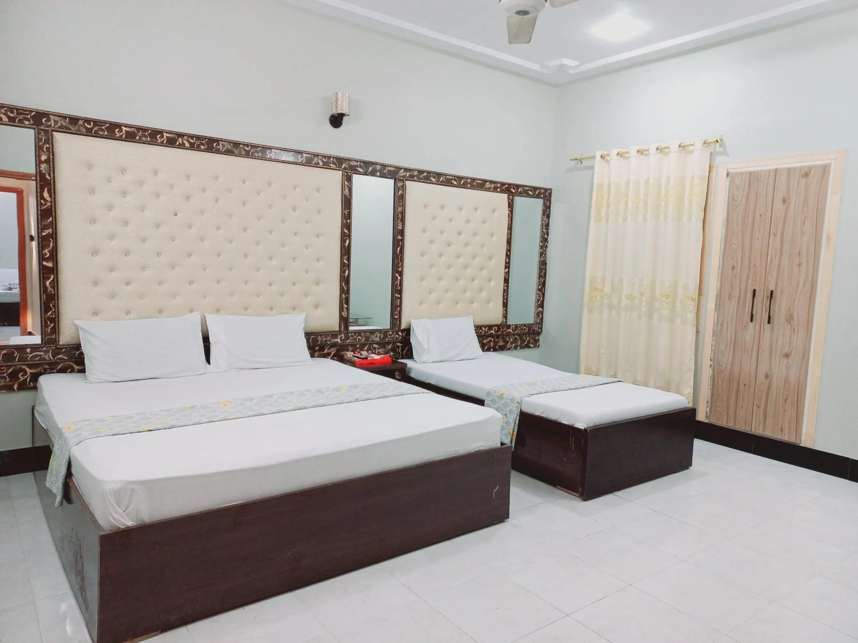 Bed in Rose Palace Guest House