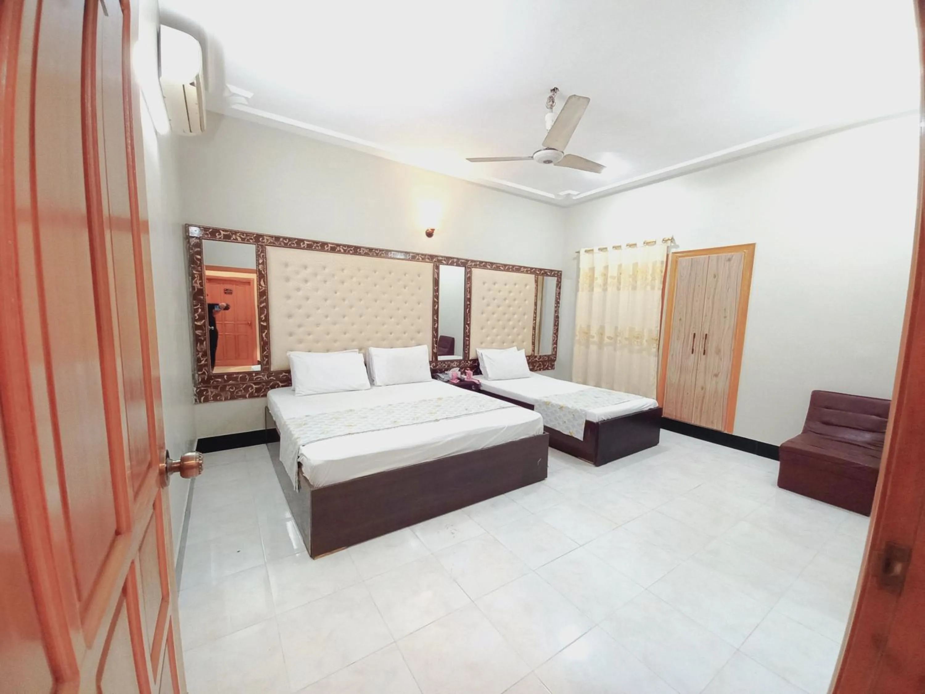 Bed in Rose Palace Guest House