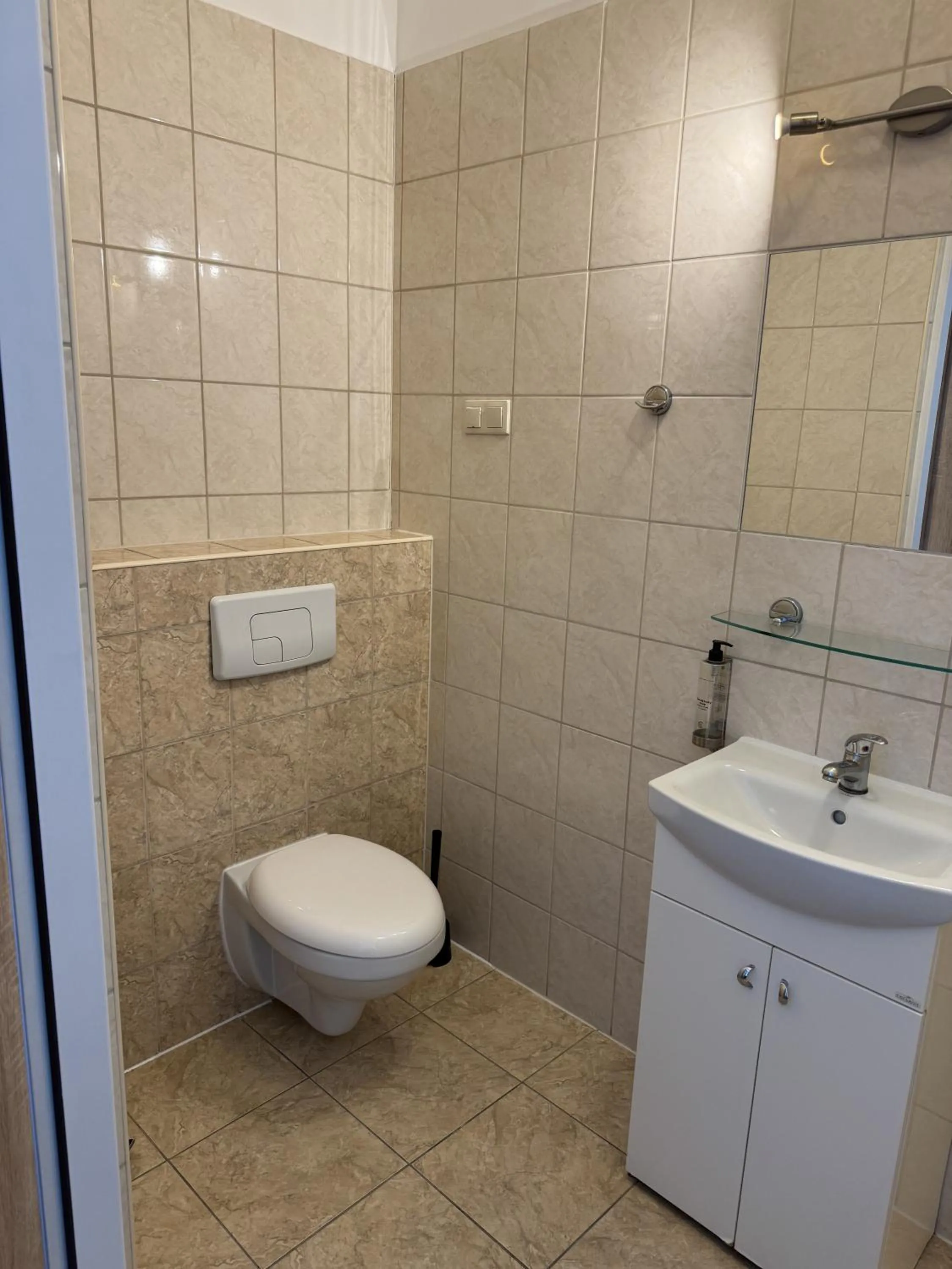 Shower in IRIS Aparthotel