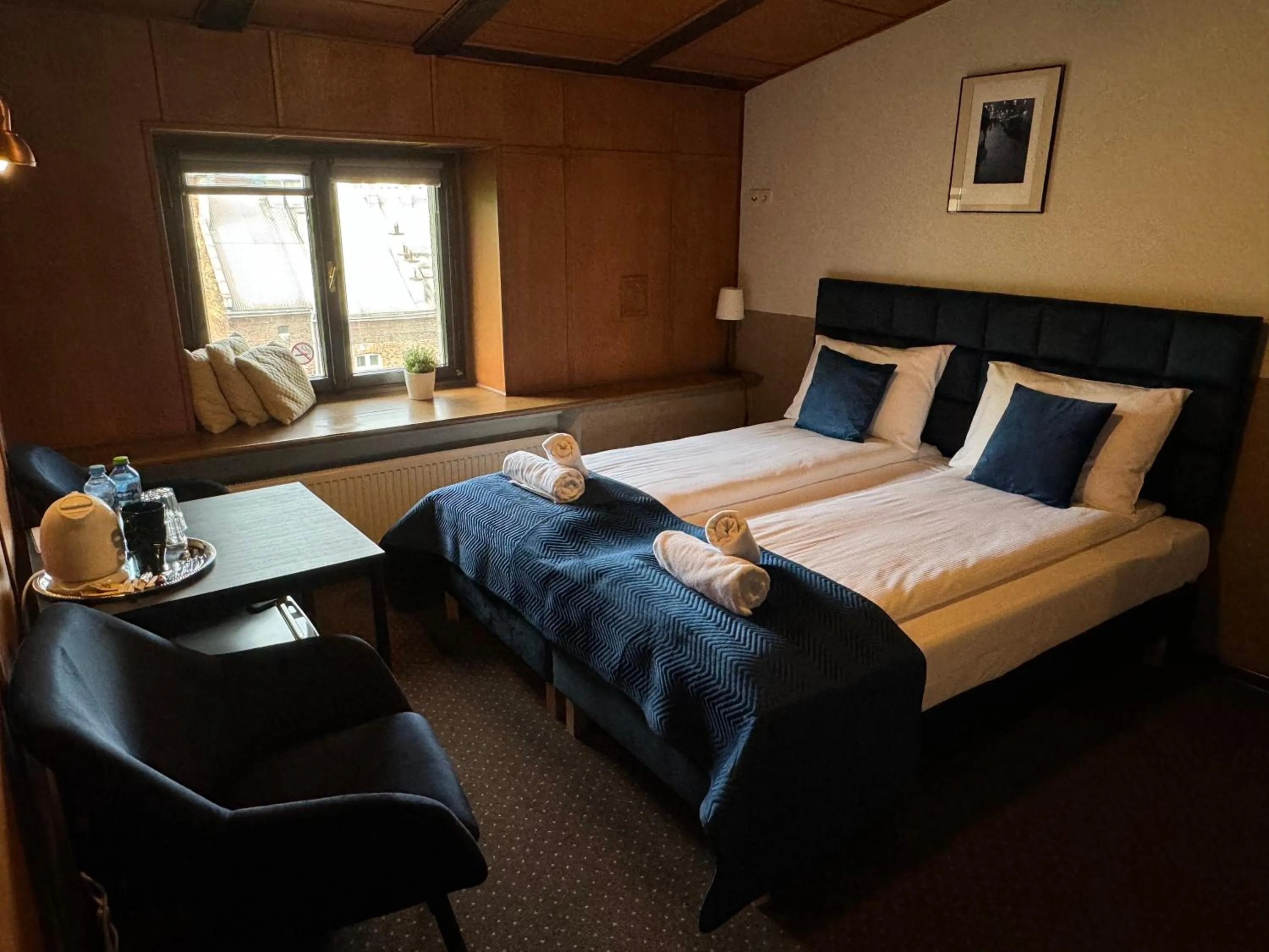 Bed in IRIS Aparthotel