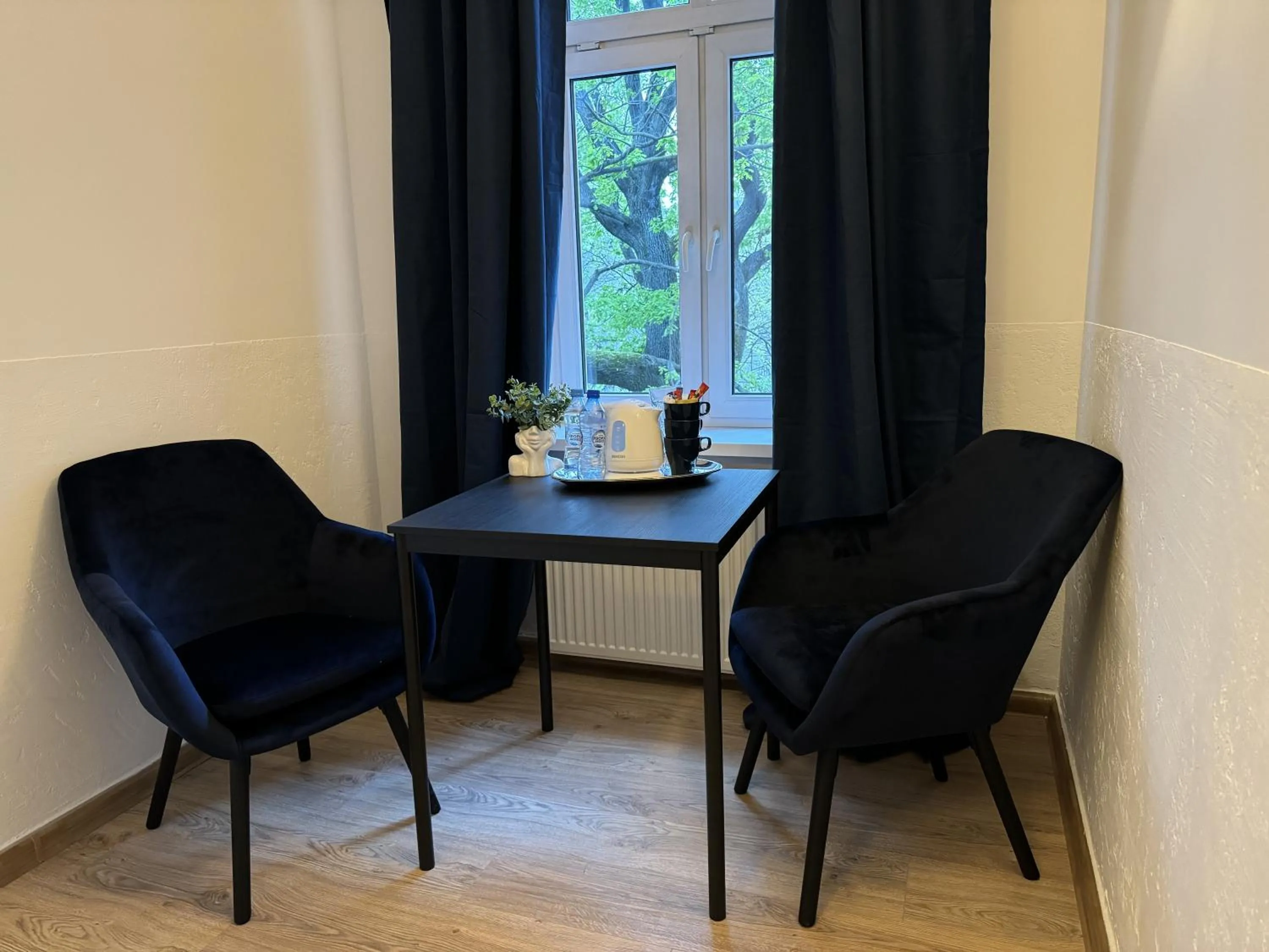 Living room in IRIS Aparthotel